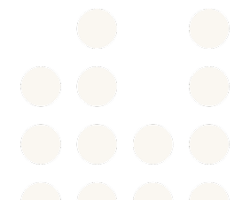 Close-up of a black domino tile with white dots.