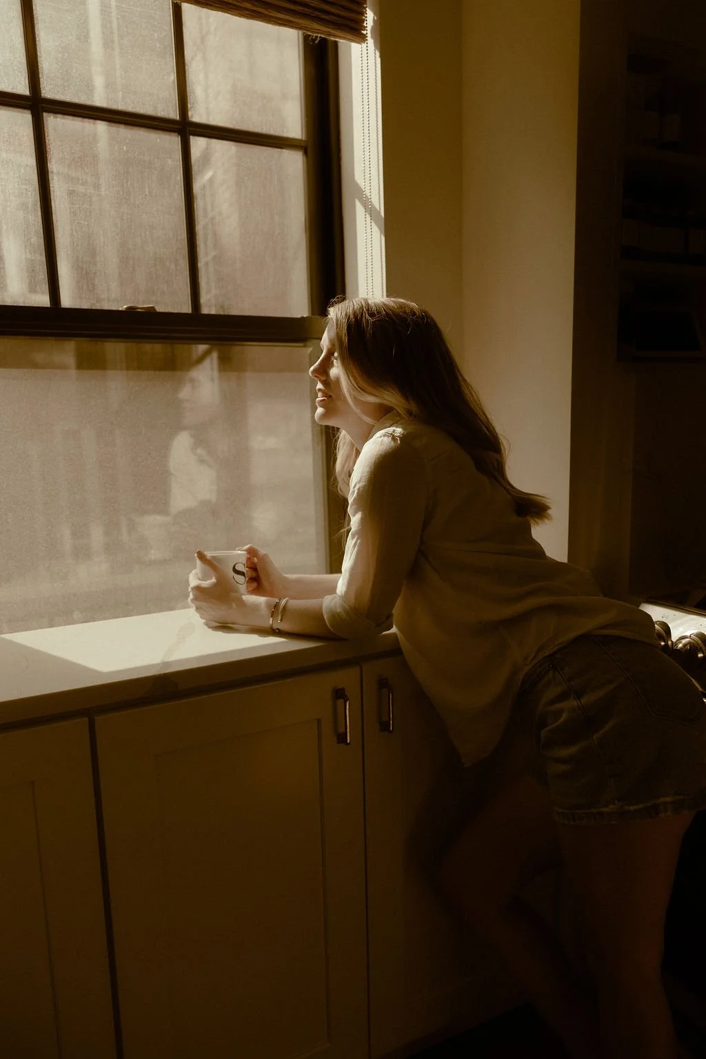 Business owner relaxing while her systems help run her hit her business goals