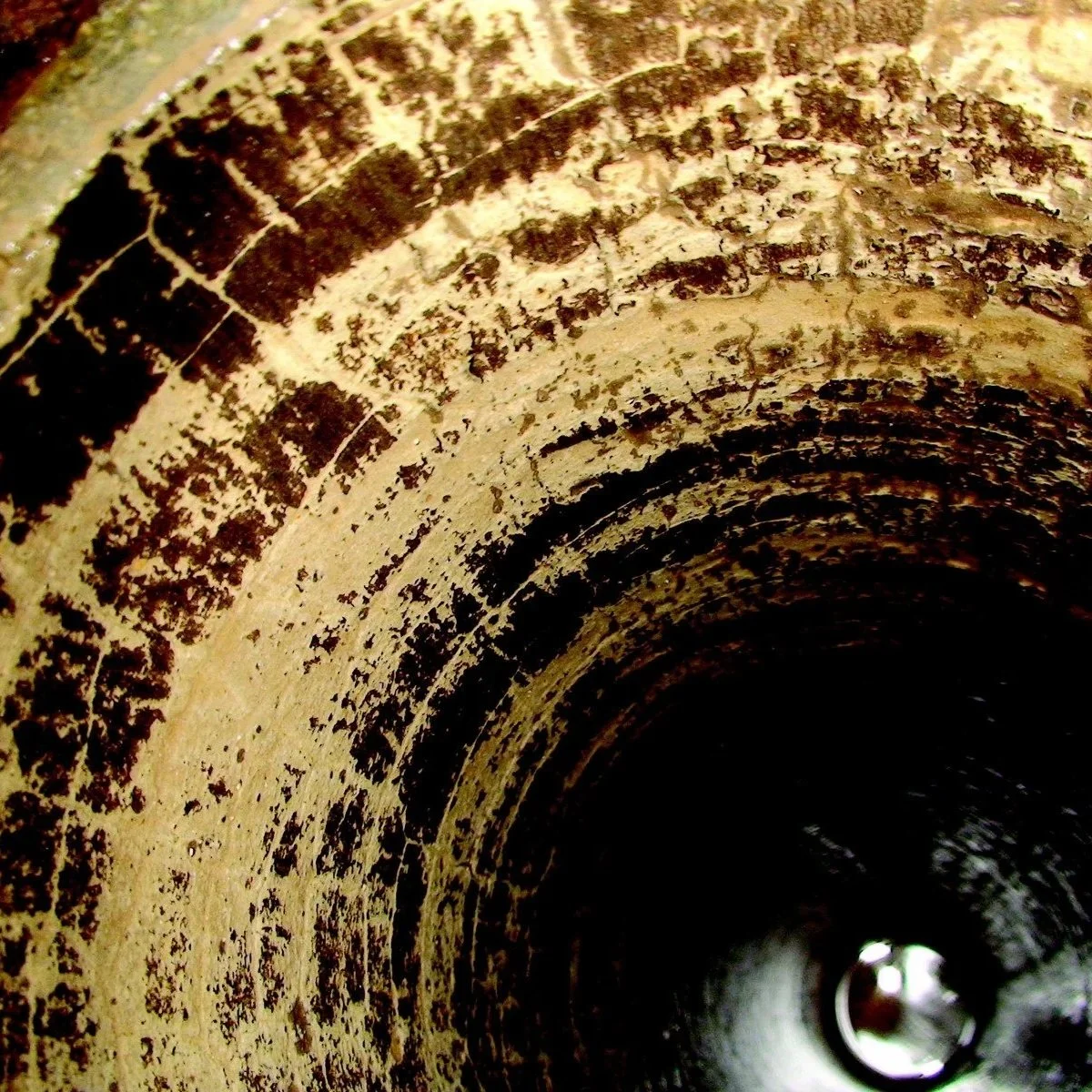 What Causes the White Crusty Buildup Inside Drain Pipes?