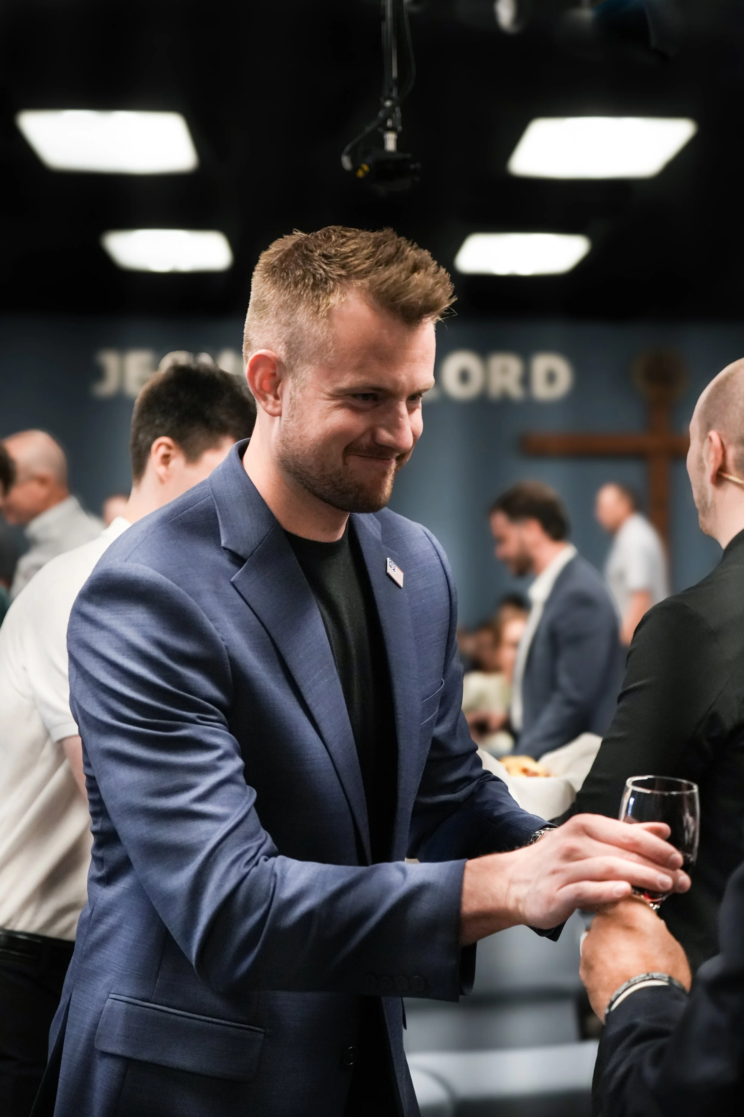 Man receiving cup from the Lord's Table