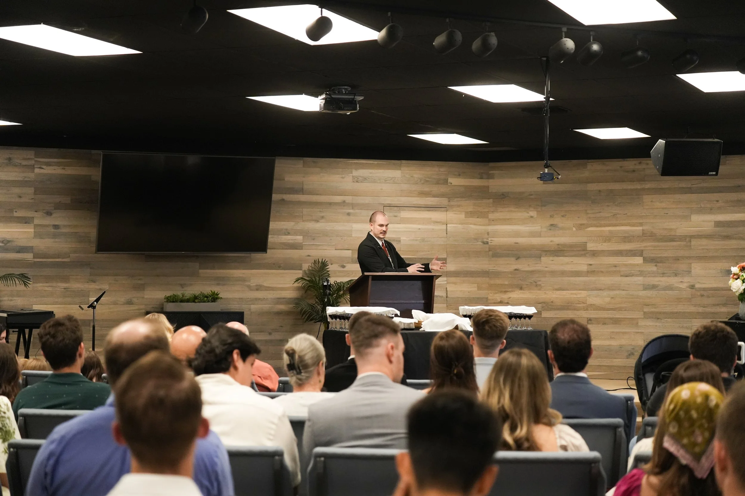 Pastor preaching with view of congregation