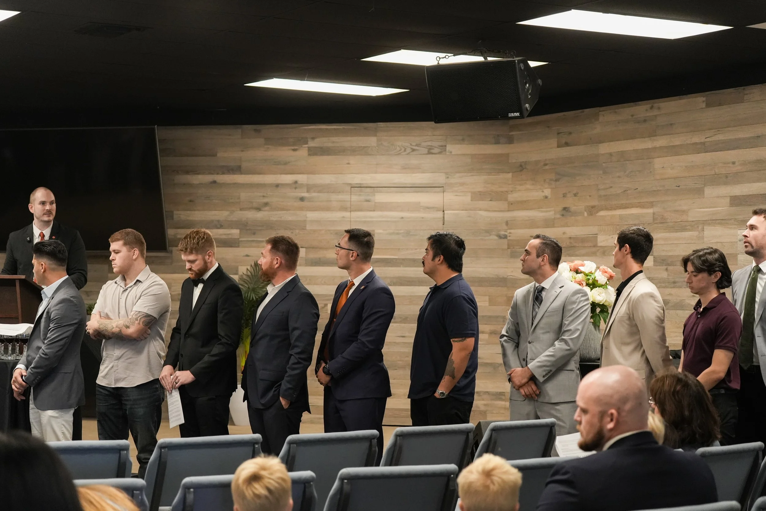 Men lined up to take membership vows