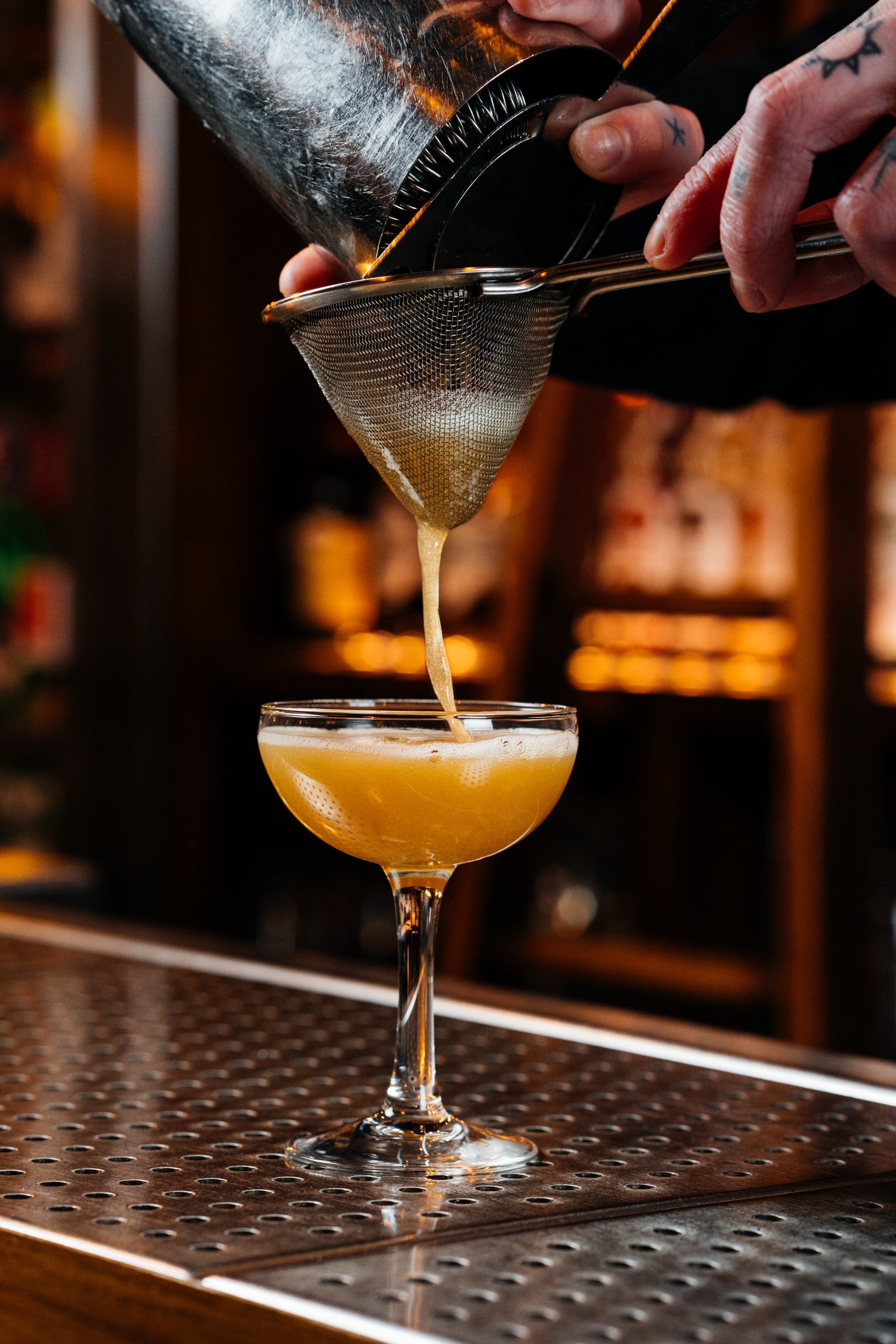 Cocktail being poured at Filthy XIII, Bristol