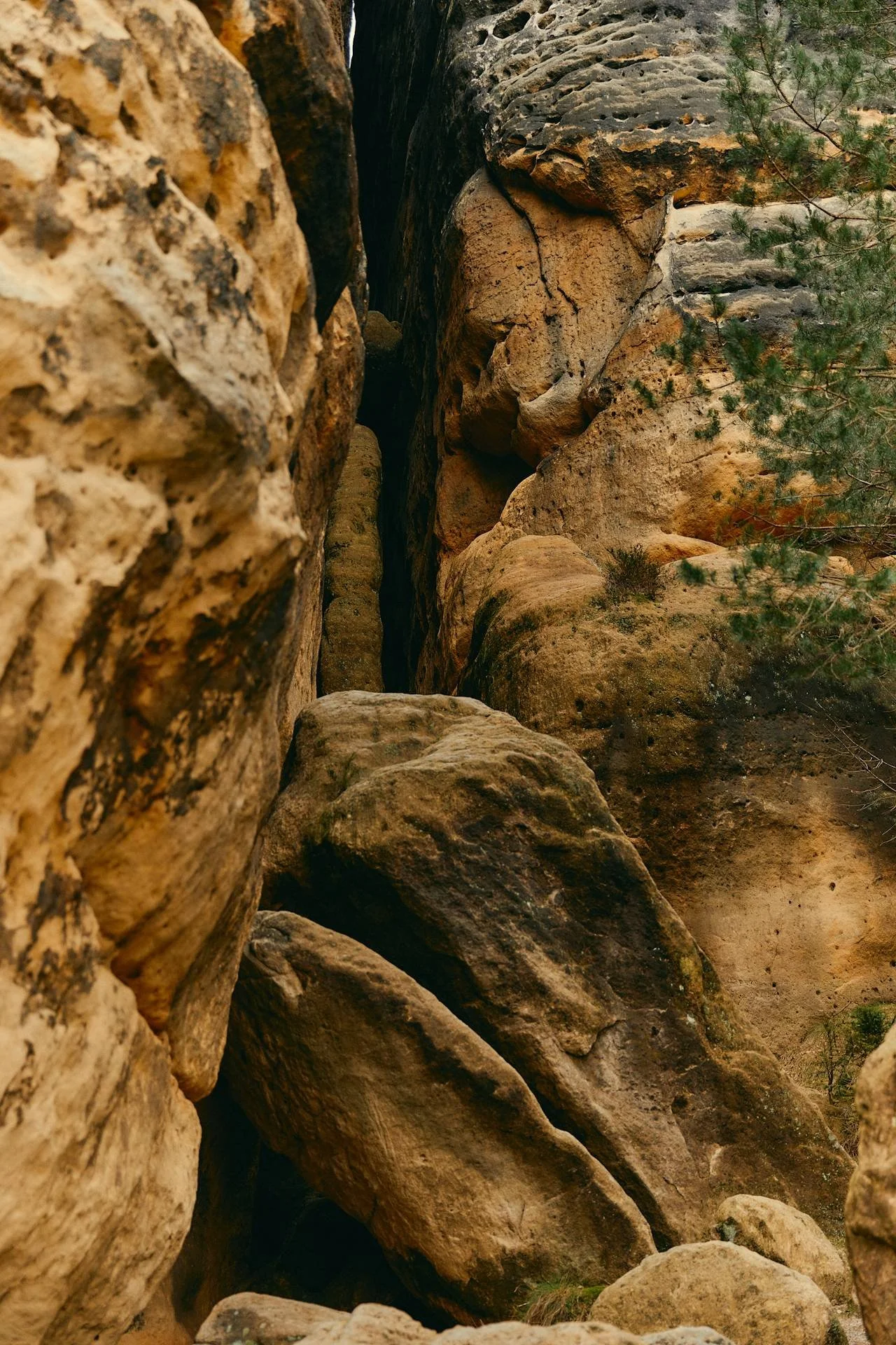 a rocky red rock cliff cave