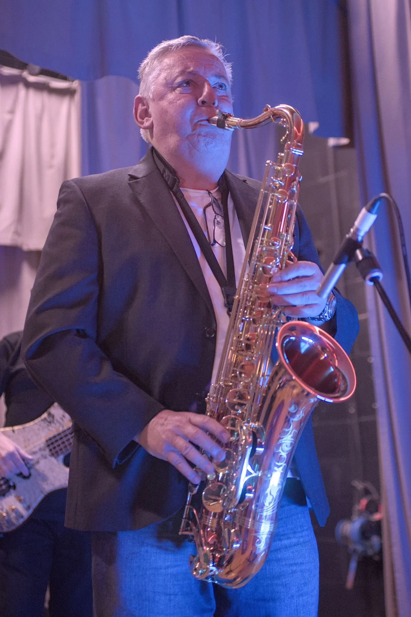 Sax man "blowing hard"