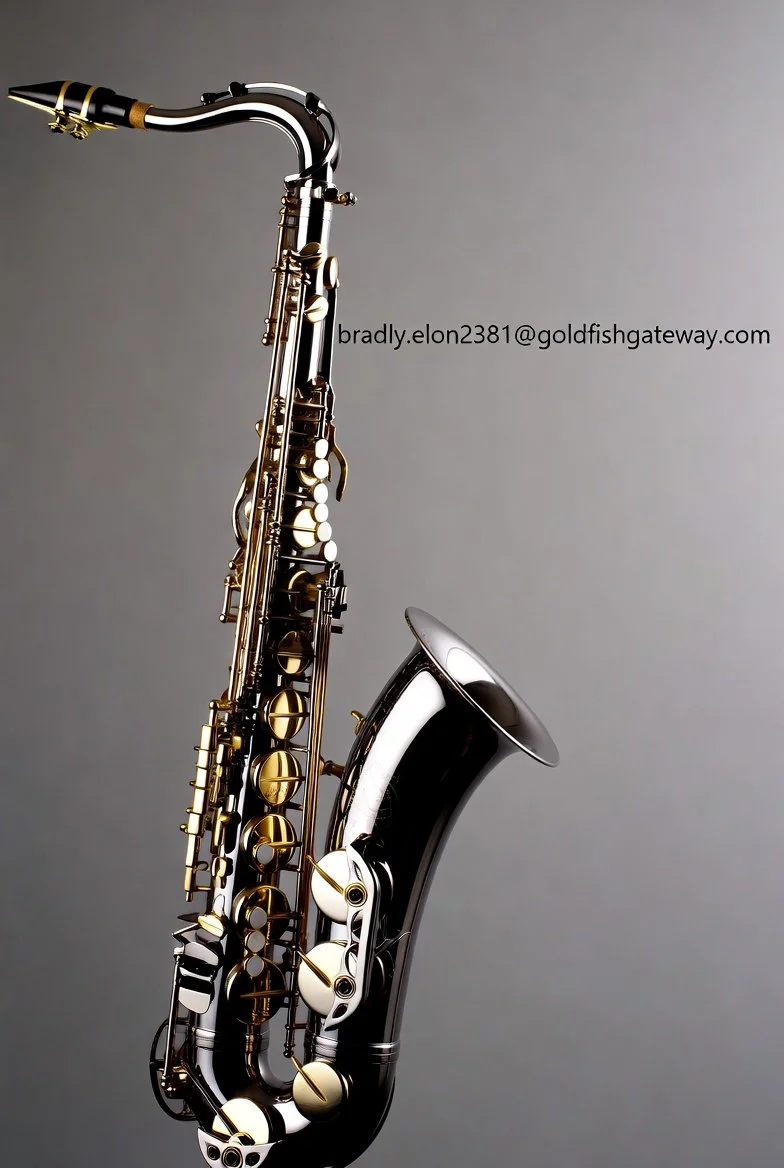 A shiny black and gold alto saxophone against a plain gray background.