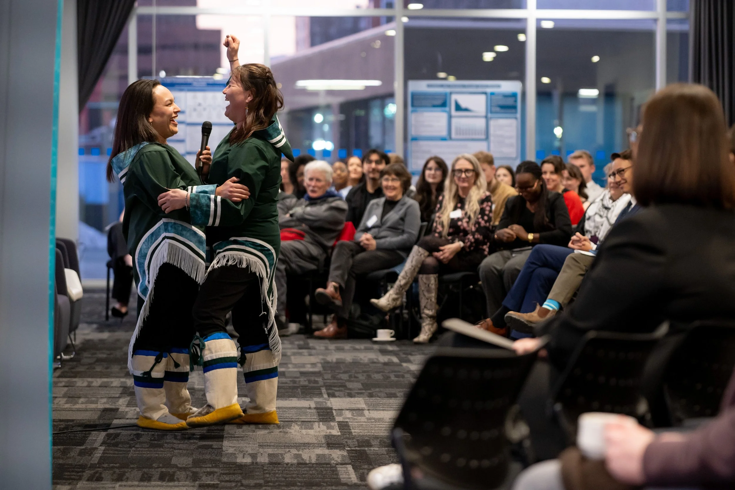 Sophie Angnatok and Ashley Dicker, Inuit artists, share drum-dancing and throat-singing