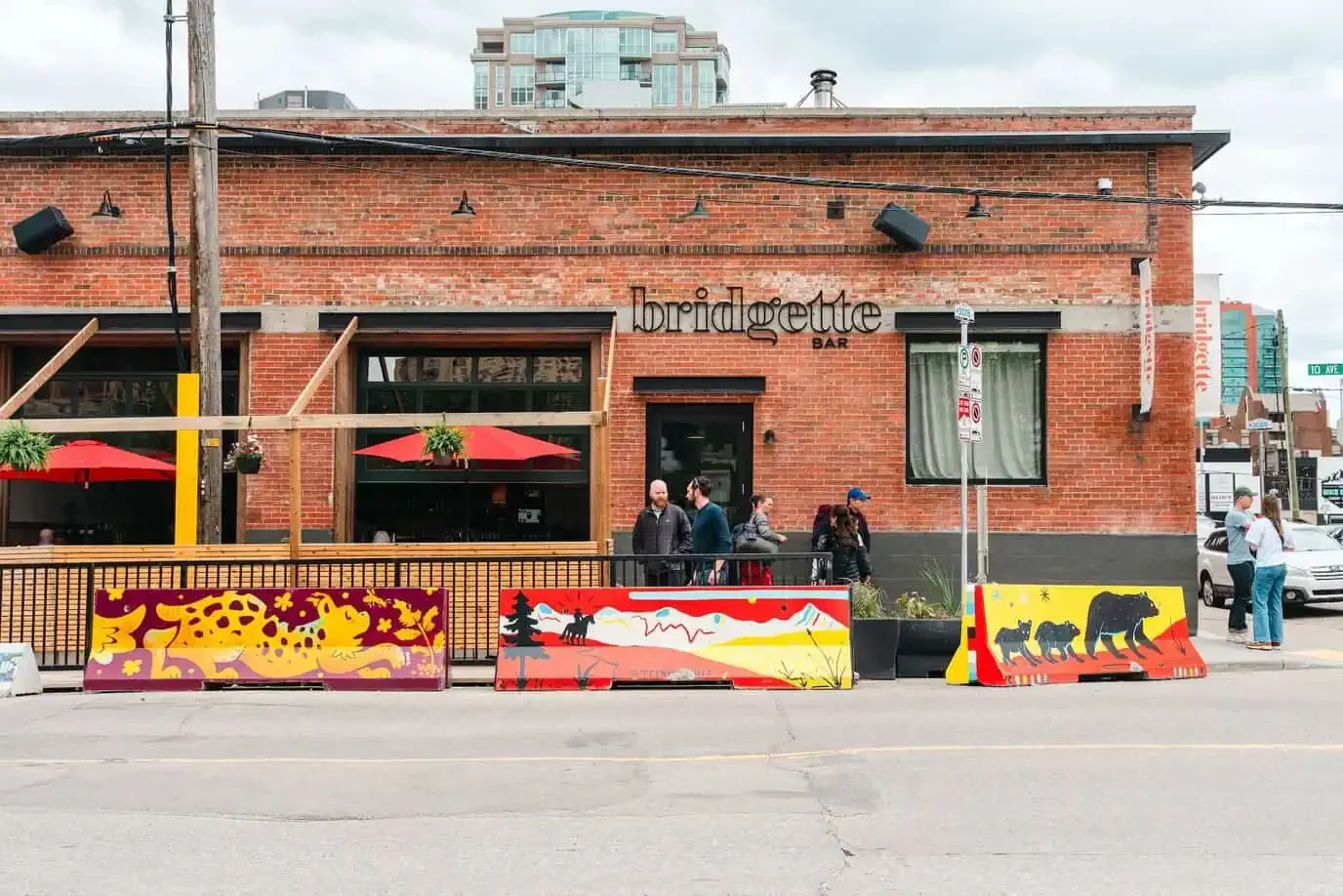Painted jersey barriers outside a Calgary restaurant