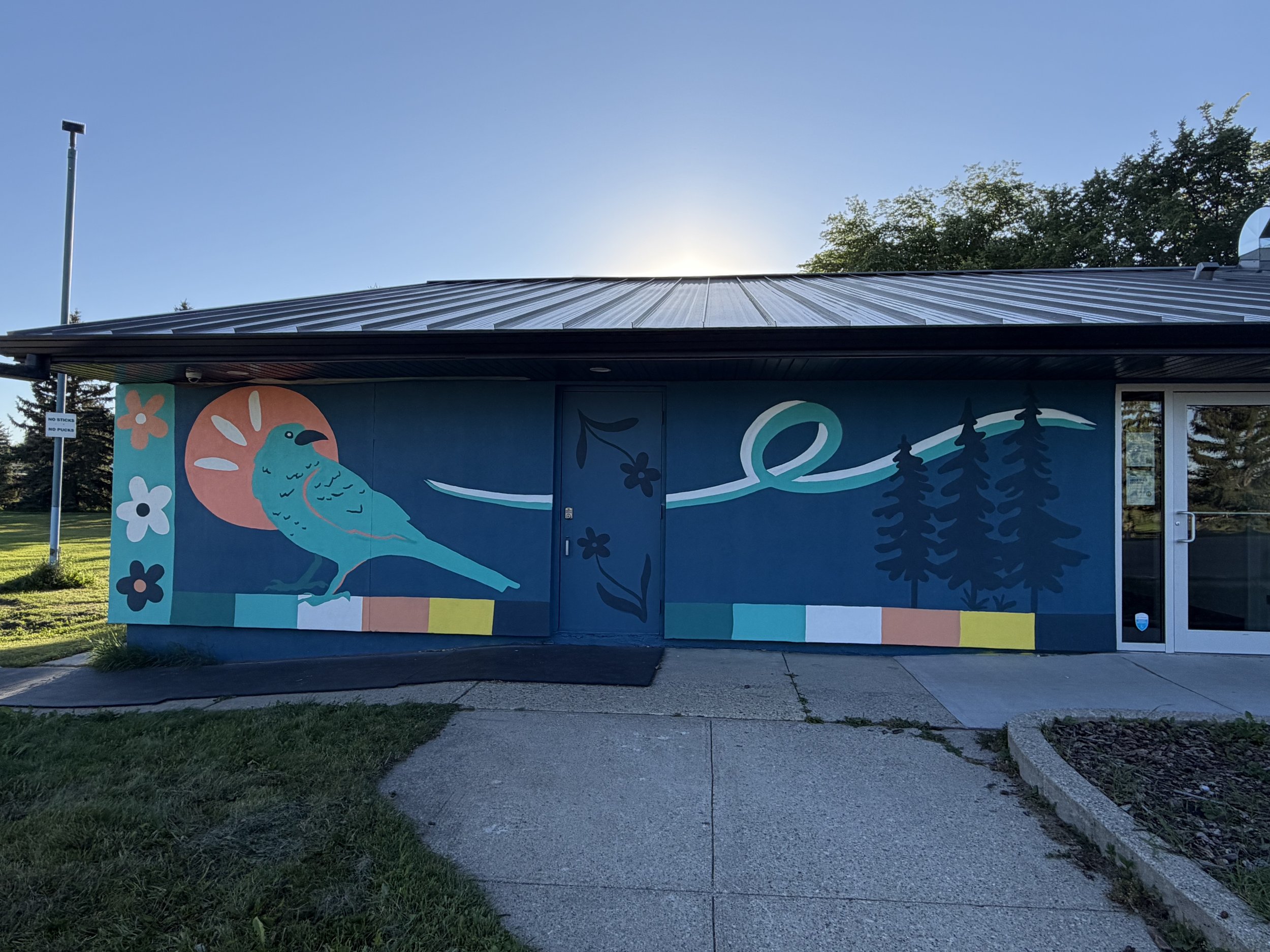 Aspen Gardens mural with birds and flowers