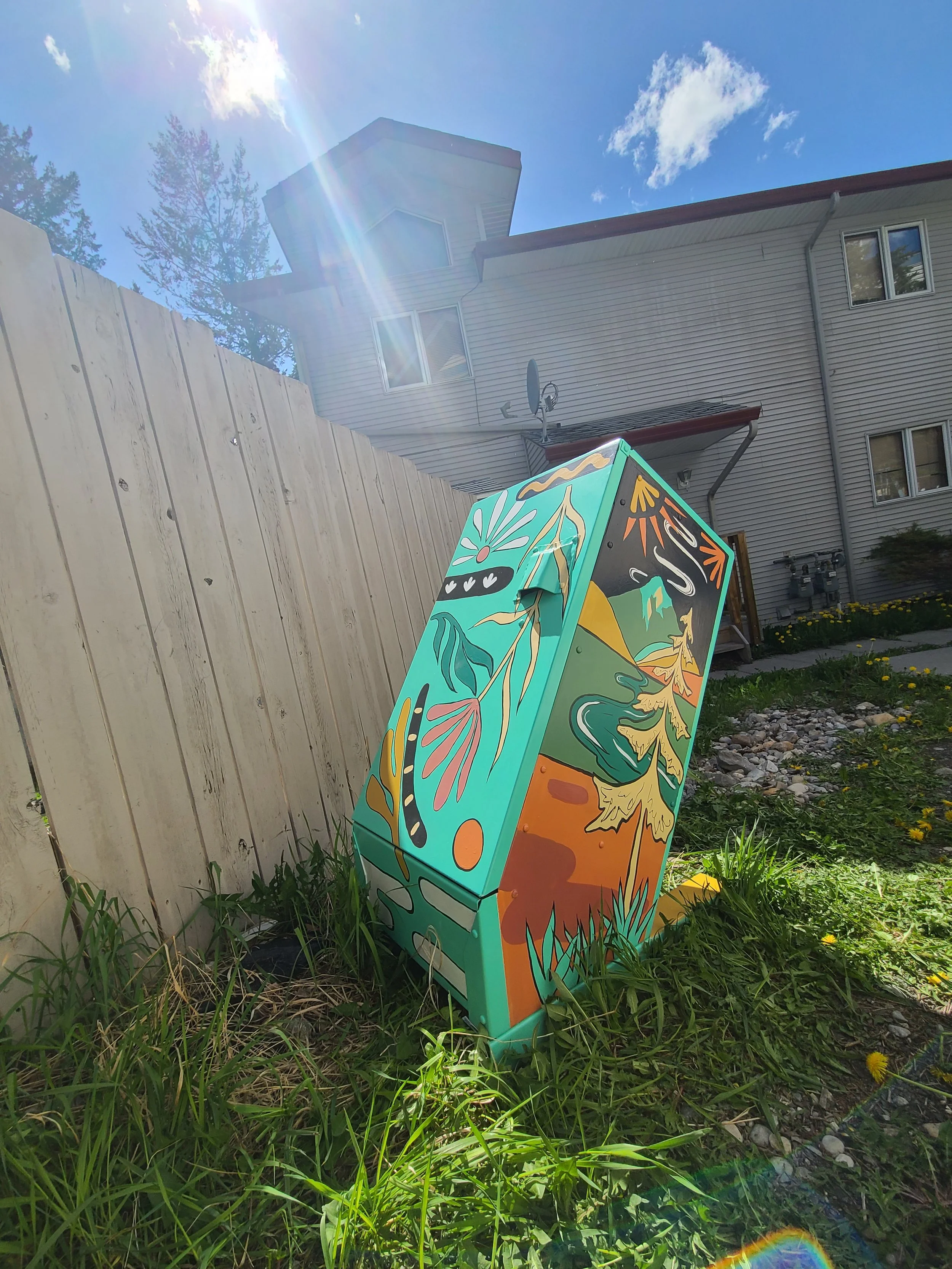 Respect the Locals bear bin in the yard