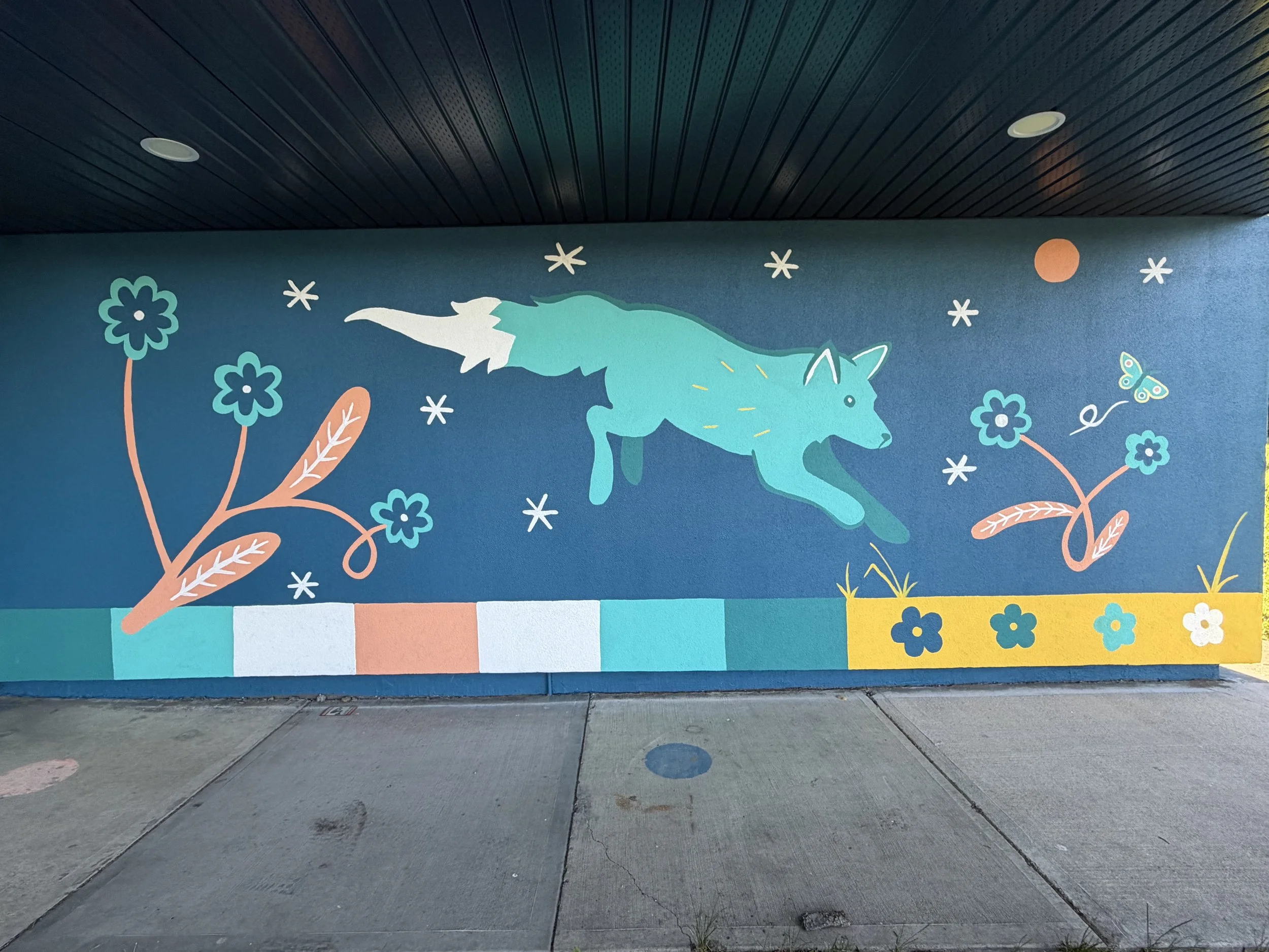 Close-up of a leaping animal in the Aspen Gardens mural