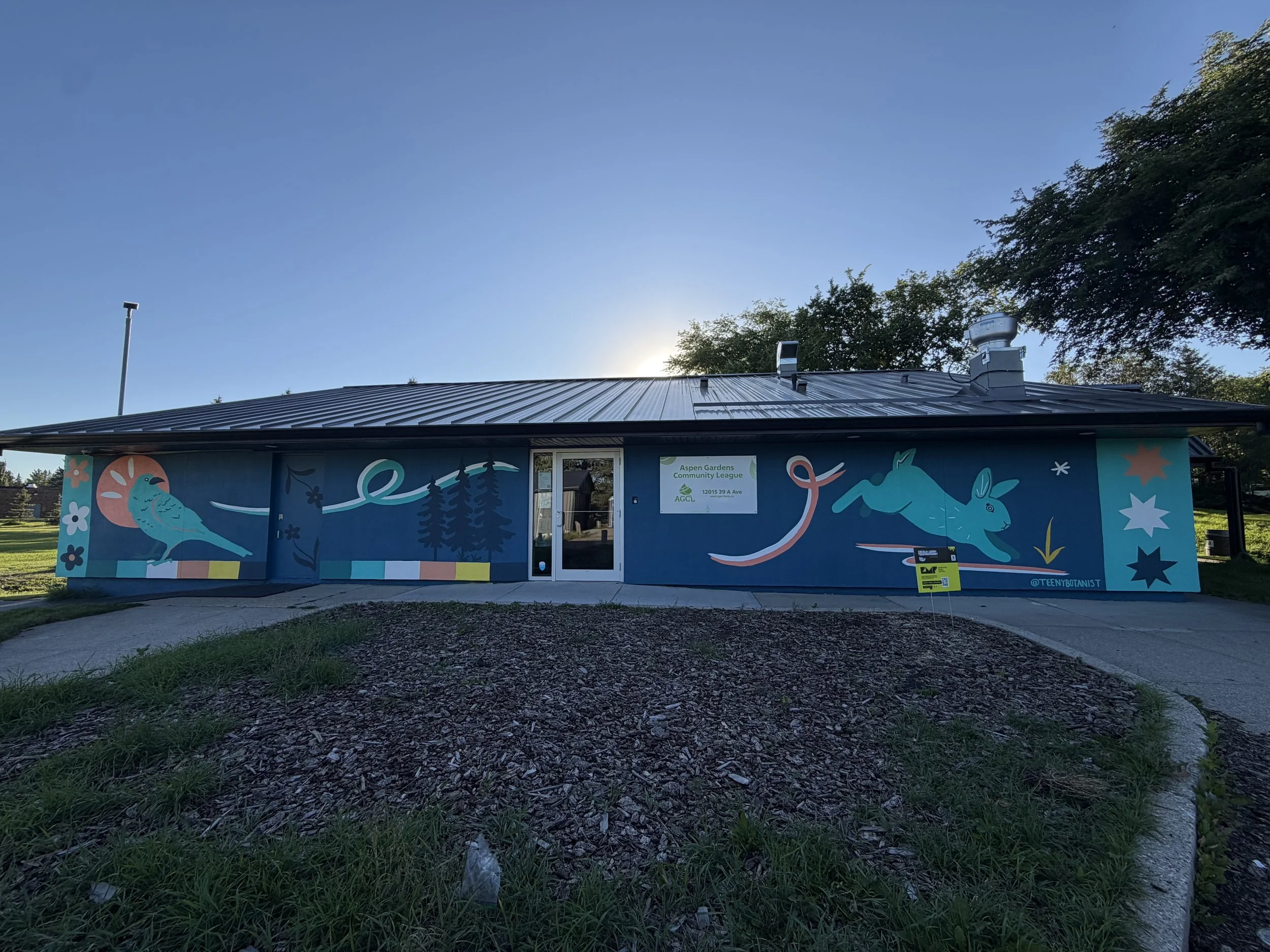 Long mural wall at Aspen Gardens Community League