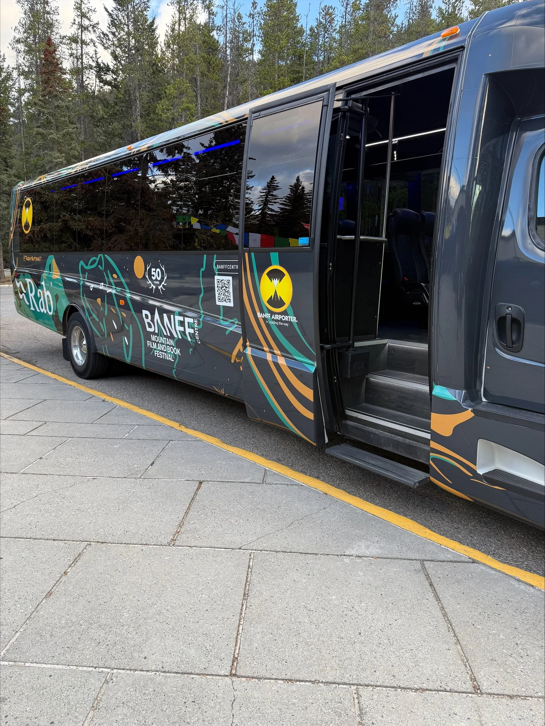 Banff Airporter shuttle wrapped in Teenybotanist artwork