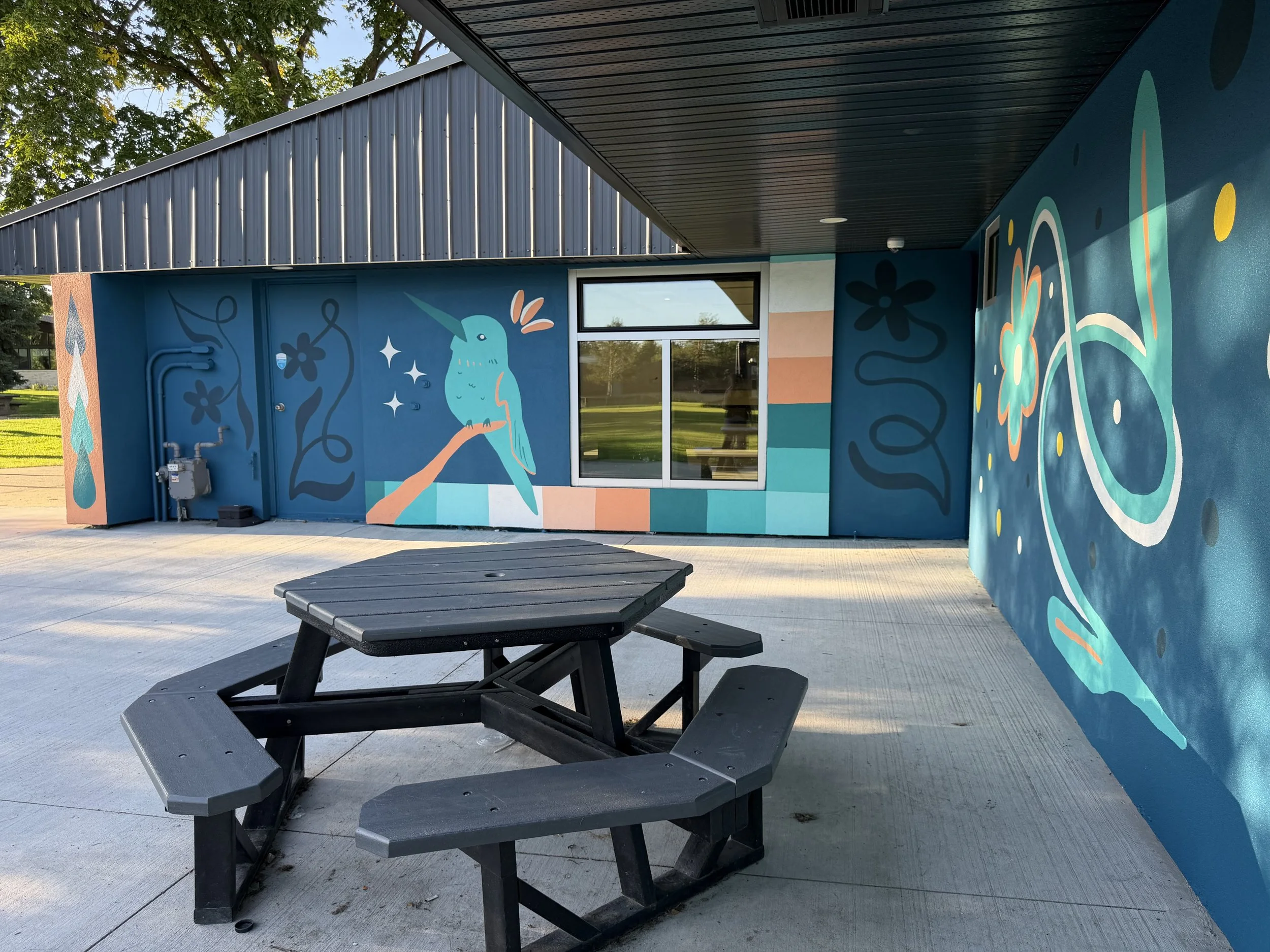 Picnic table beside Teenybotanist's Aspen Gardens murals