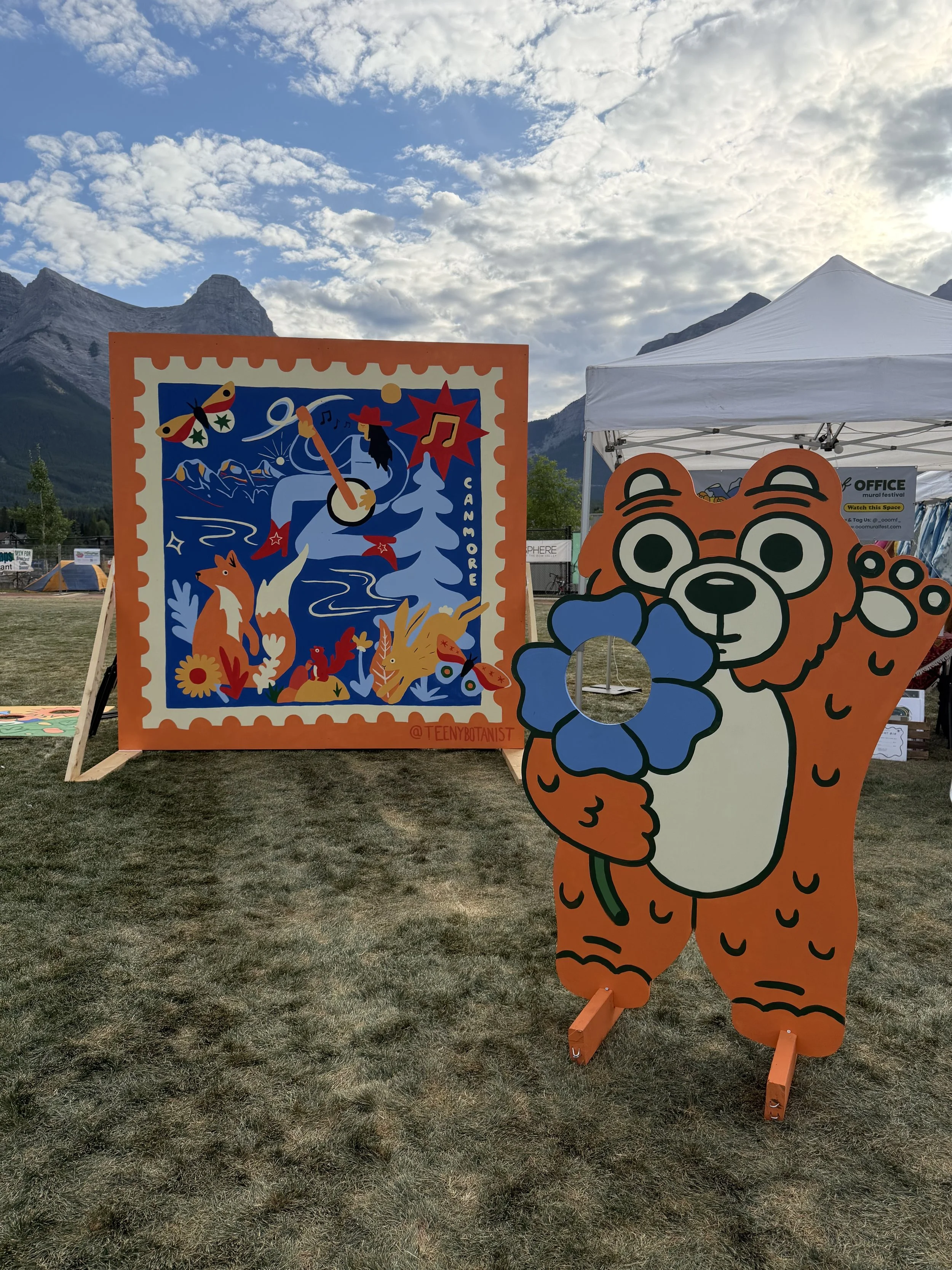 Out of Office mural and bear cutout at Canmore Folk Festival