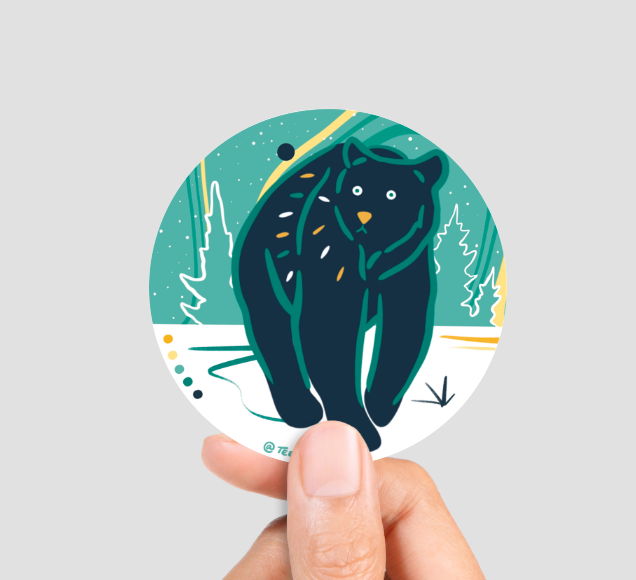 Bear sticker by Teenybotanist, held in a hand