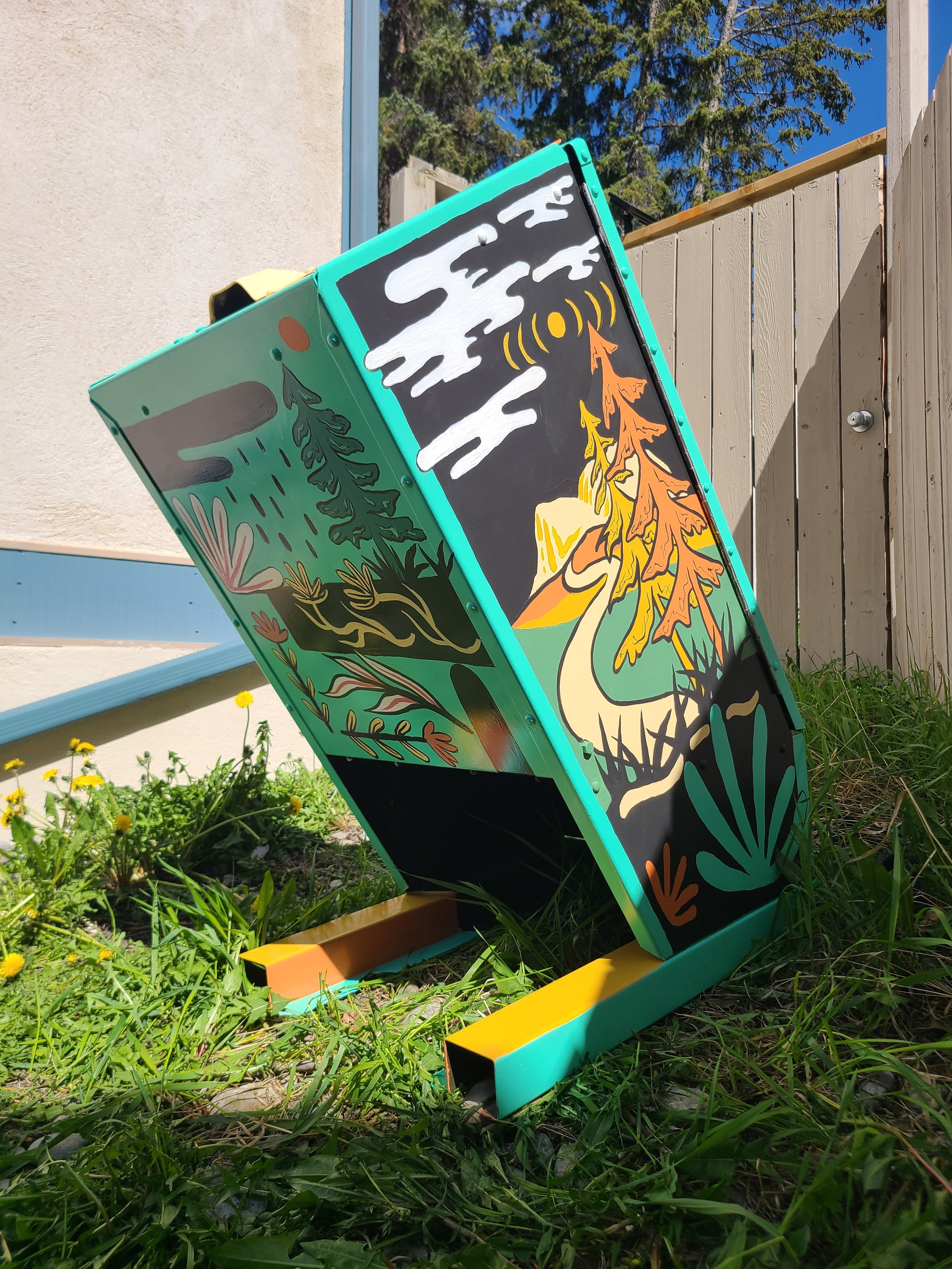Side panel of the Respect the Locals bear bin