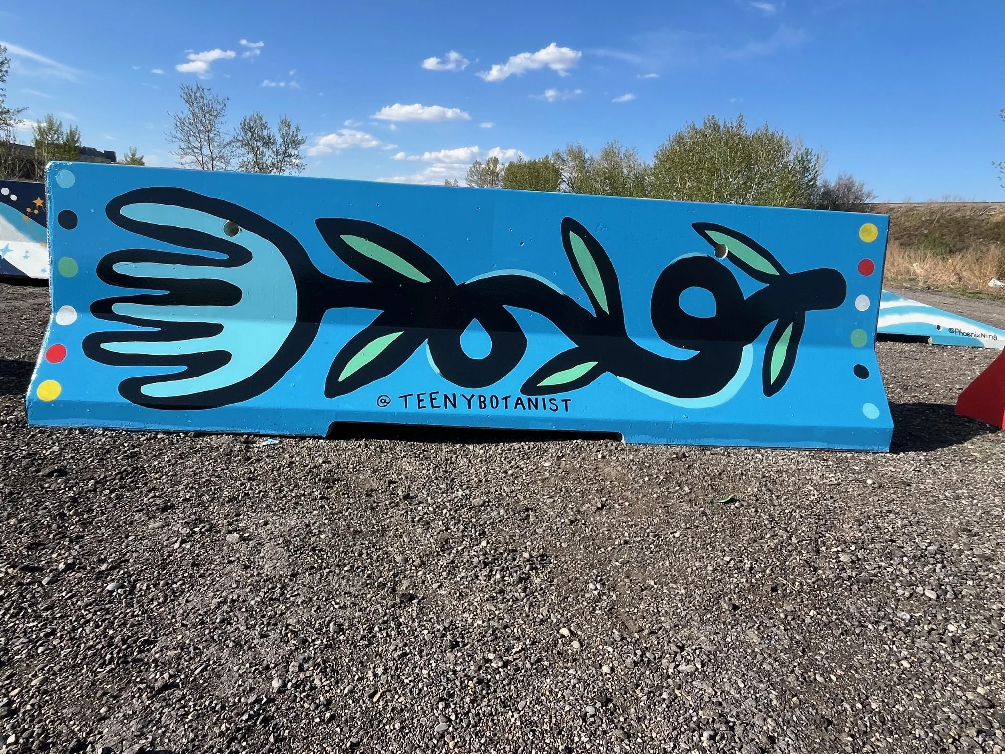 Jersey barrier with a blue swirling pattern, BUMP Road Works by Teenybotanist