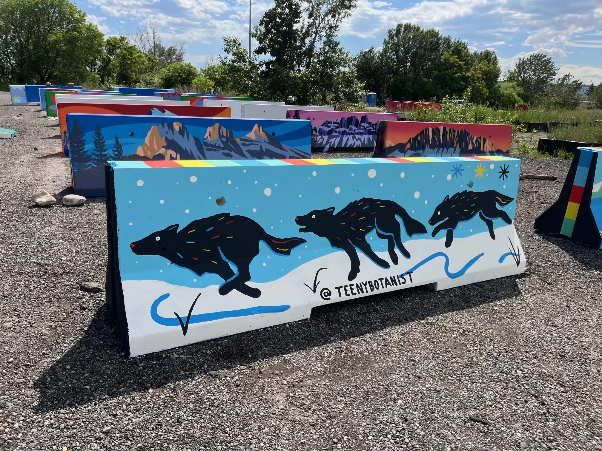Jersey barrier with running wolves on blue, BUMP Road Works by Teenybotanist