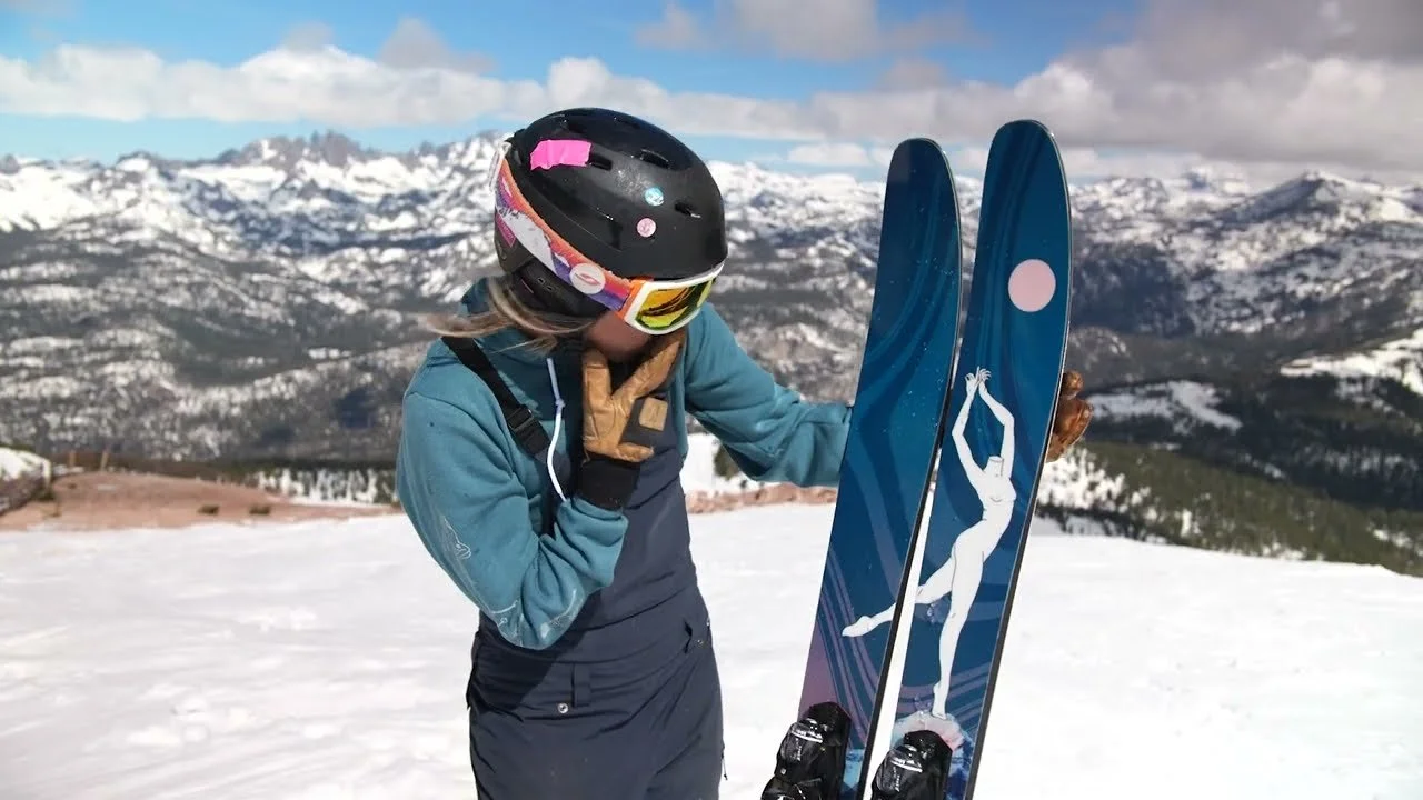 Skier with La Nieve skis on a snowy summit