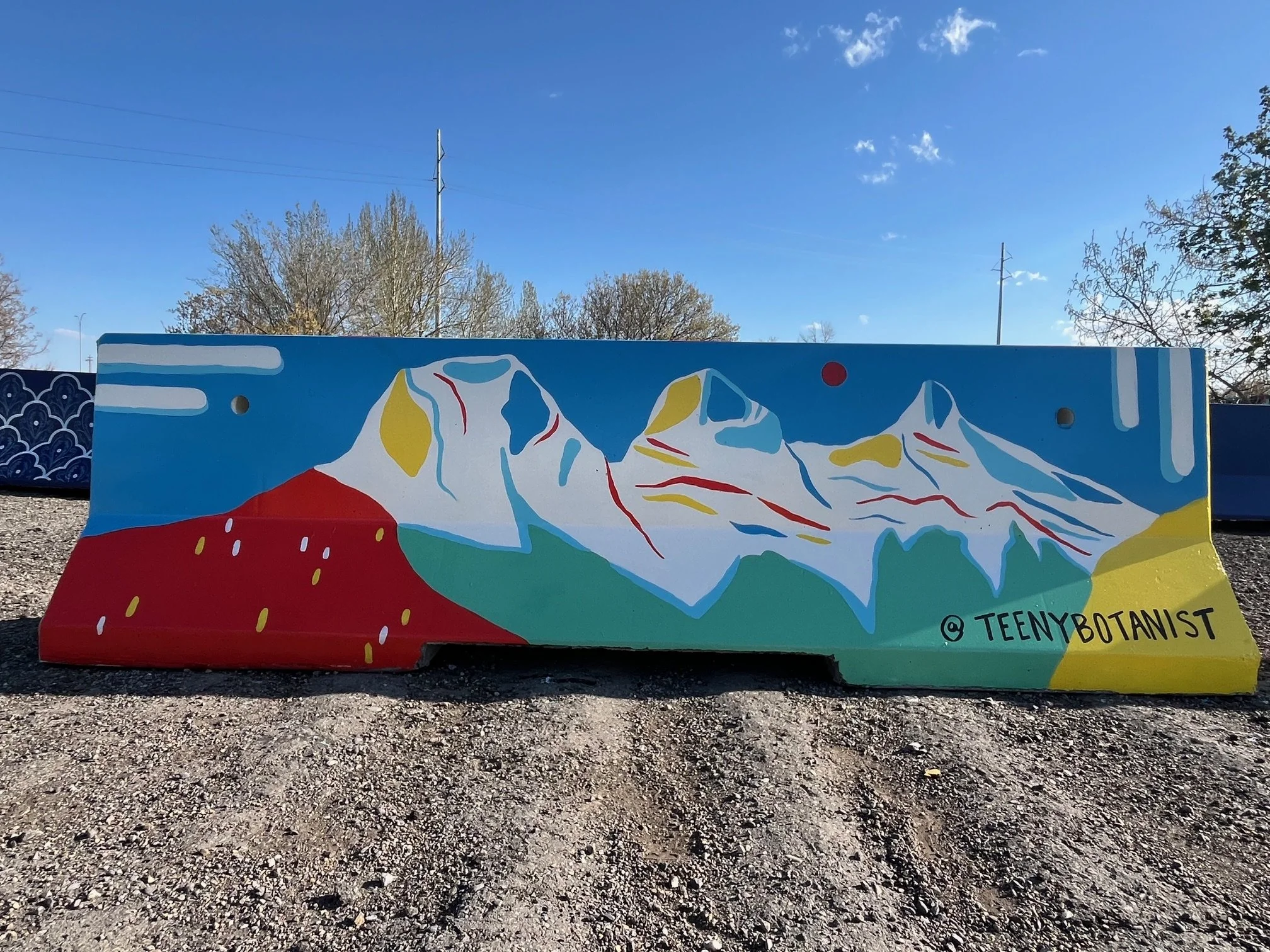 Jersey barrier with a mountain range design, BUMP Road Works by Teenybotanist