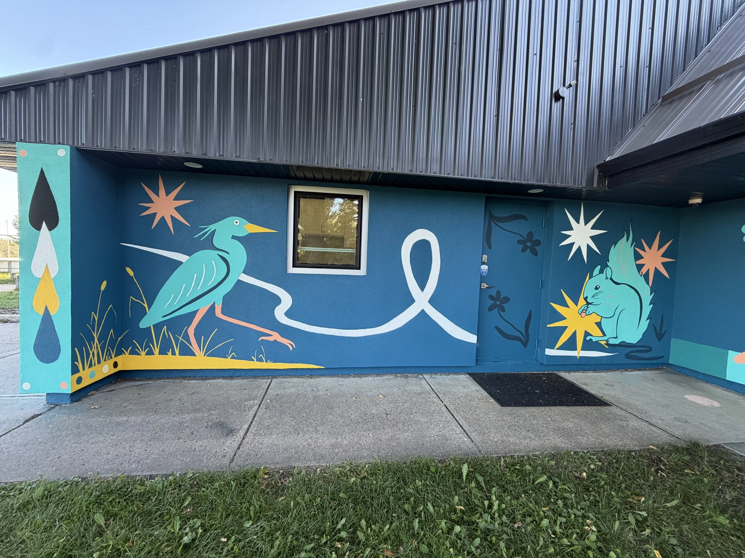 Aspen Gardens mural wall with wildlife and florals