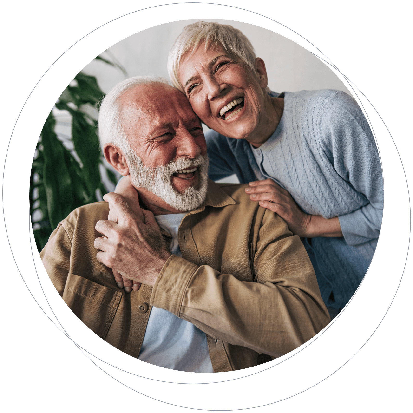 An elderly man with a white beard and elderly woman with short gray hair sharing a joyful moment, smiling and laughing together.