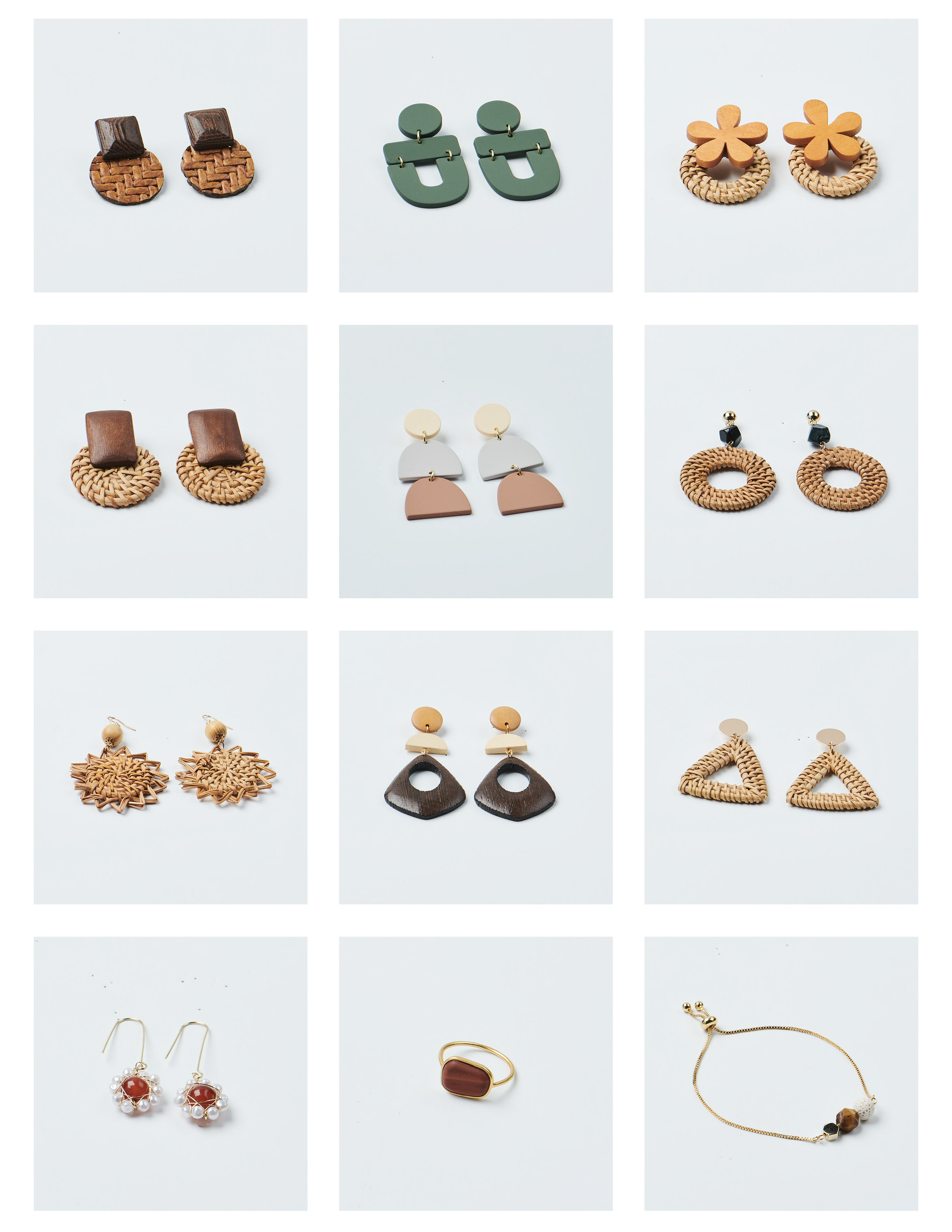 Collection of various earrings and necklaces on display. The jewelry features different styles, materials, and designs including woven, plastic, metal, and beaded accents.