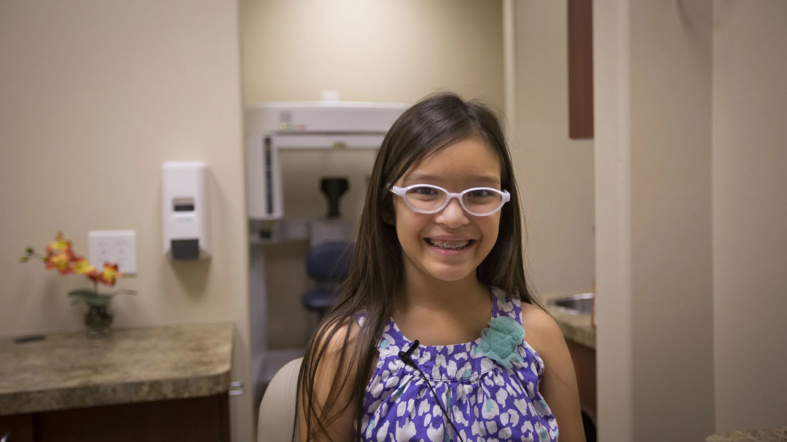 A young girl smiling before her orthodontic appointment at Beth&rsquo;s Braces in Las Vegas