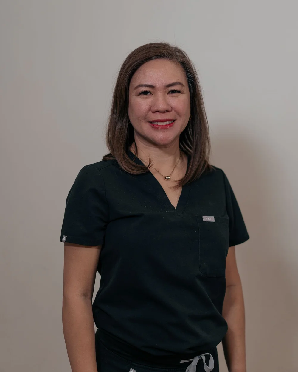 Regie, orthodontic assistant at Beth's Braces in Las Vegas, speaks Tagalog and English