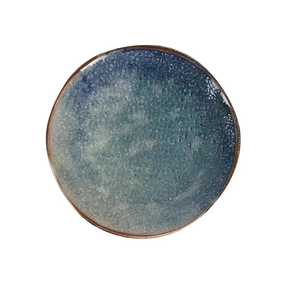 Blue stoneware dinner plate with textured glazed finish and rustic brown rim