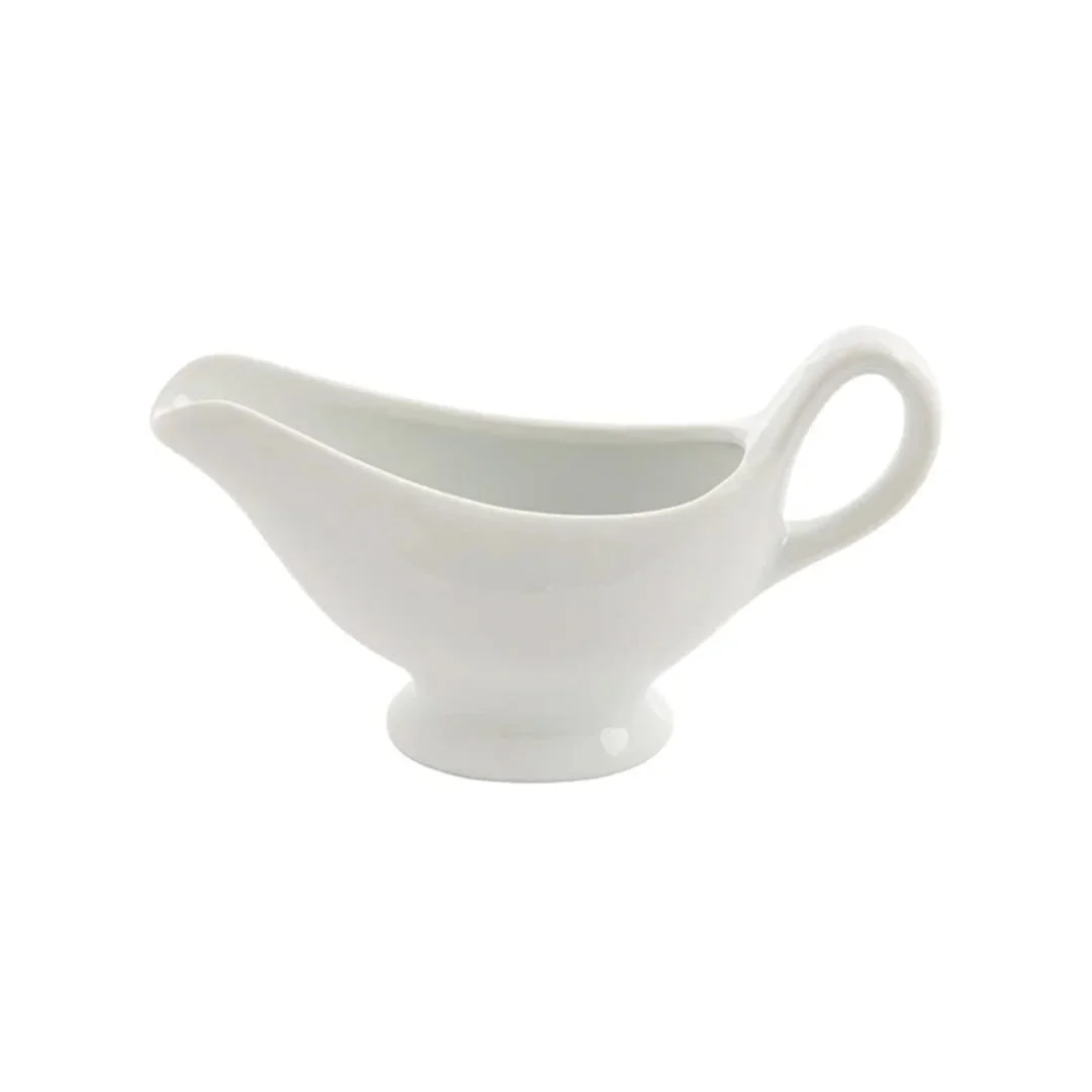 White gravy boat with handle for serving sauces and gravy