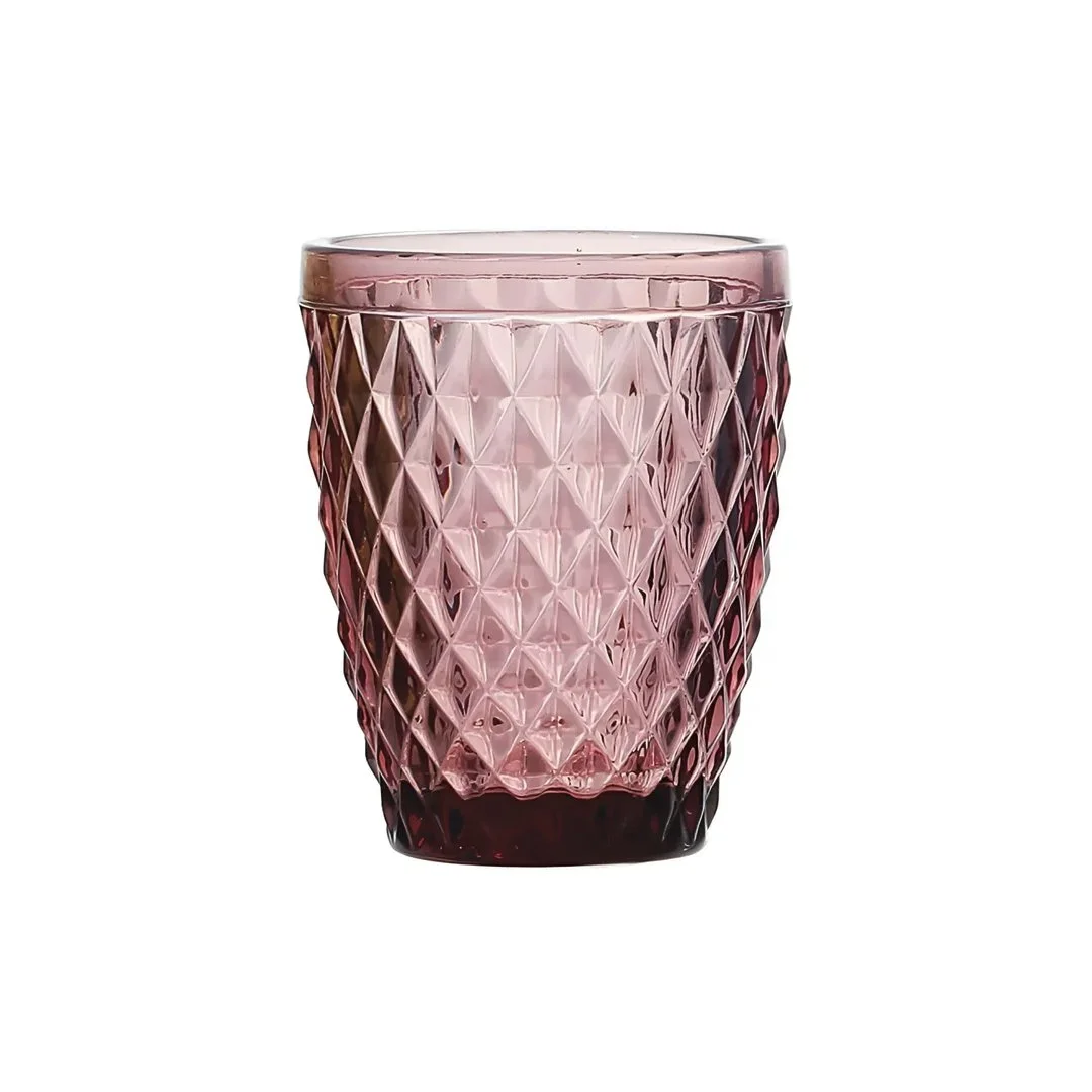 Pink glass tumbler with a textured diamond pattern