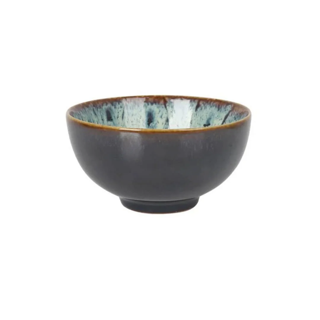 Dark noodle bowl with blue glazed interior and rustic textured finish