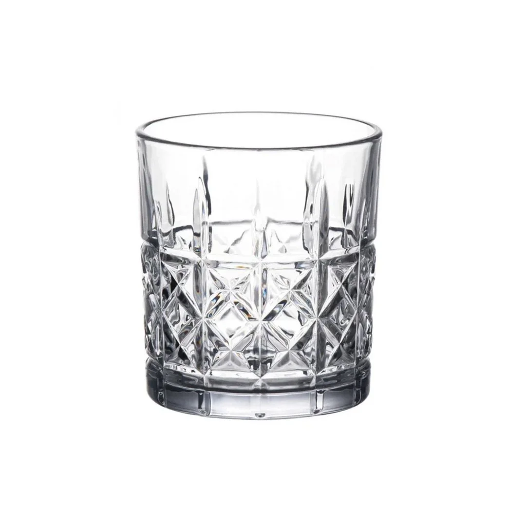 Cut crystal whiskey glass with a textured pattern and thick base