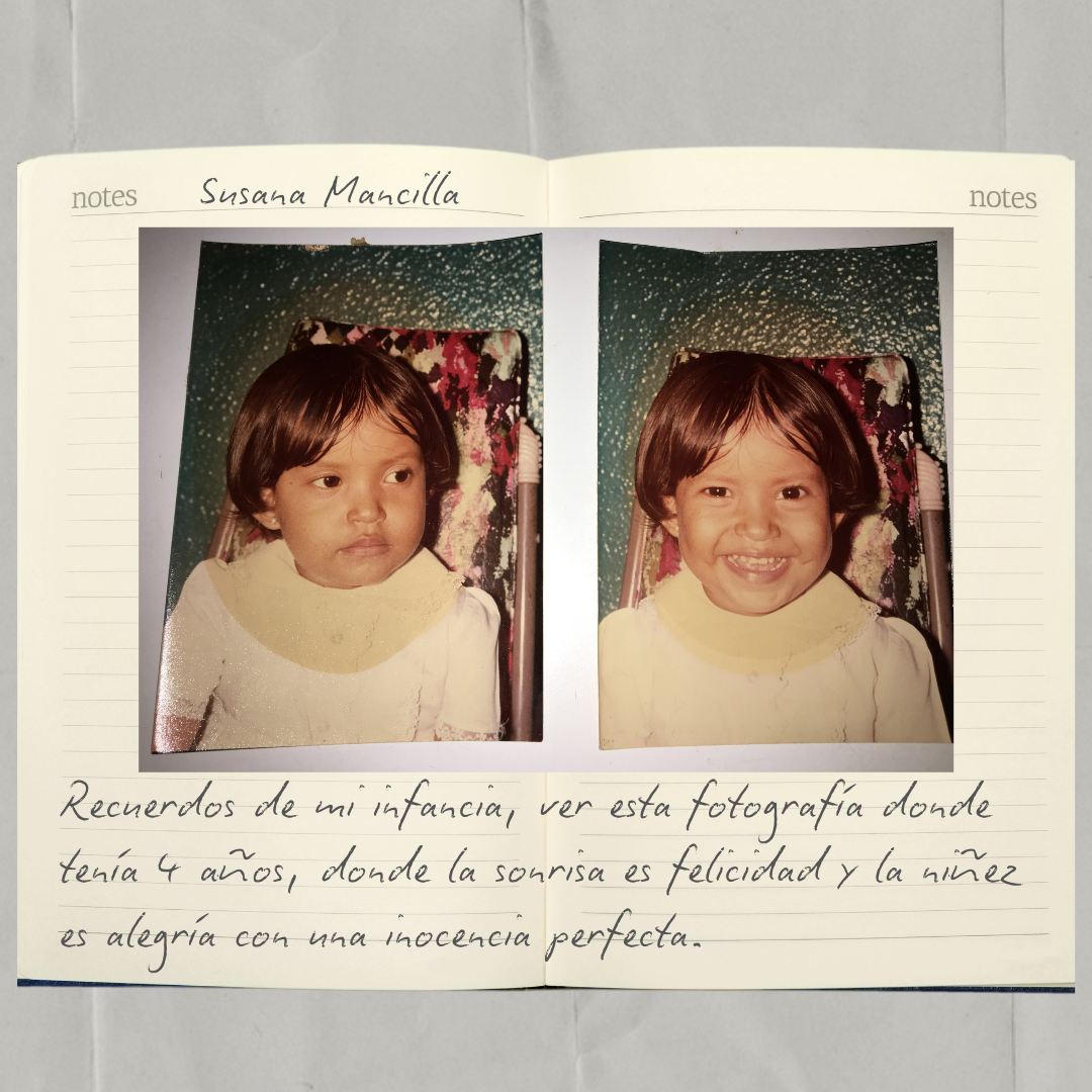 Open notebook with two childhood photographs of the same girl, one serious and one smiling. Handwritten notes in Spanish below the photos about childhood memories. by Lesley Reyes written by Susana Reyes 