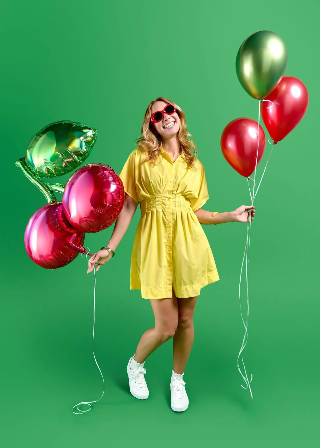 A vibrant birthday balloon arrangement featuring cherry shapes and metallic red tones, perfect for festive party supplies in Seattle’s Leschi and Mount Baker neighborhoods.