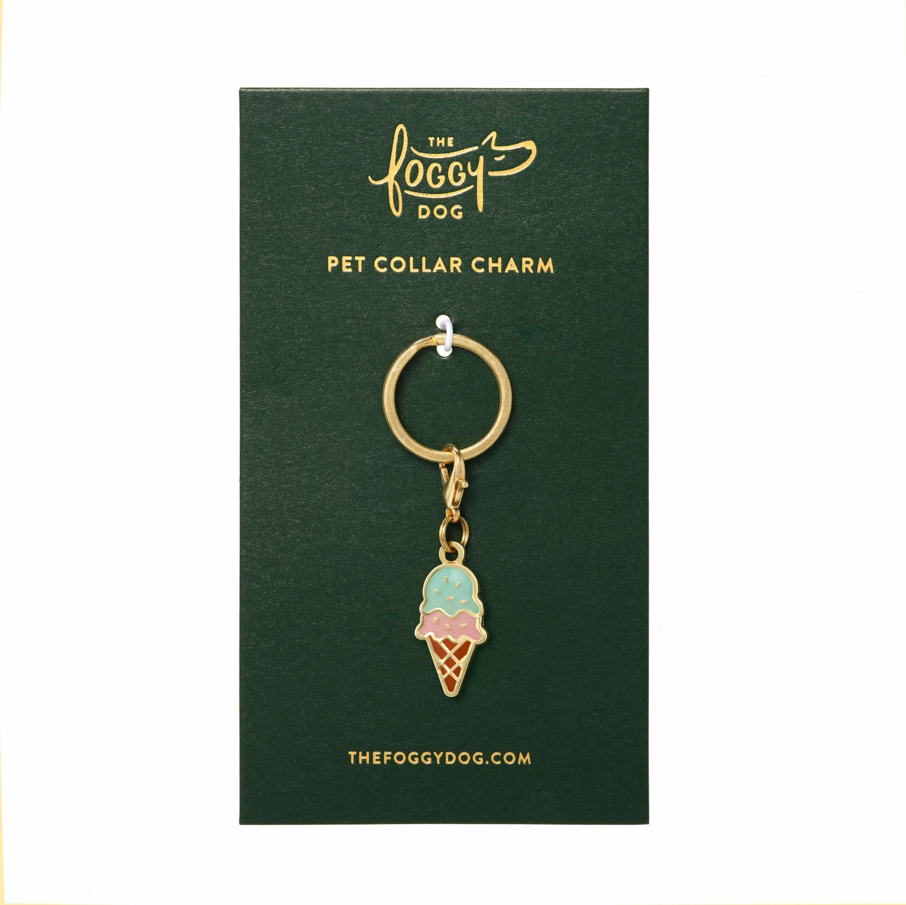 A gold and enamel ice cream cone pet collar charm, a sweet addition to our curated party supplies serving families in Mount Baker and Madrona.