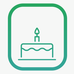 A birthday cake with a single lit candle on top.