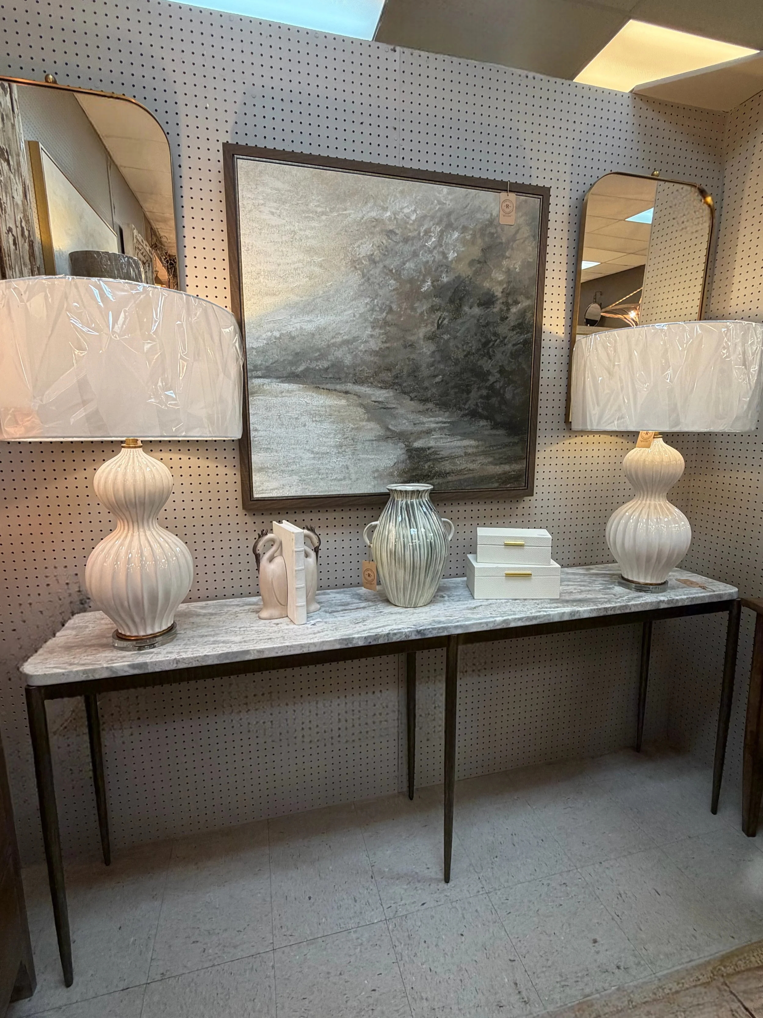 soft tones, layered texture, and a view that feels like an exhale. 🤍
this console moment mixes organic shapes, moody landscapes, and just enough contrast to keep it elevated. the kind of styling that makes a home feel collected, calm, and lived in.
