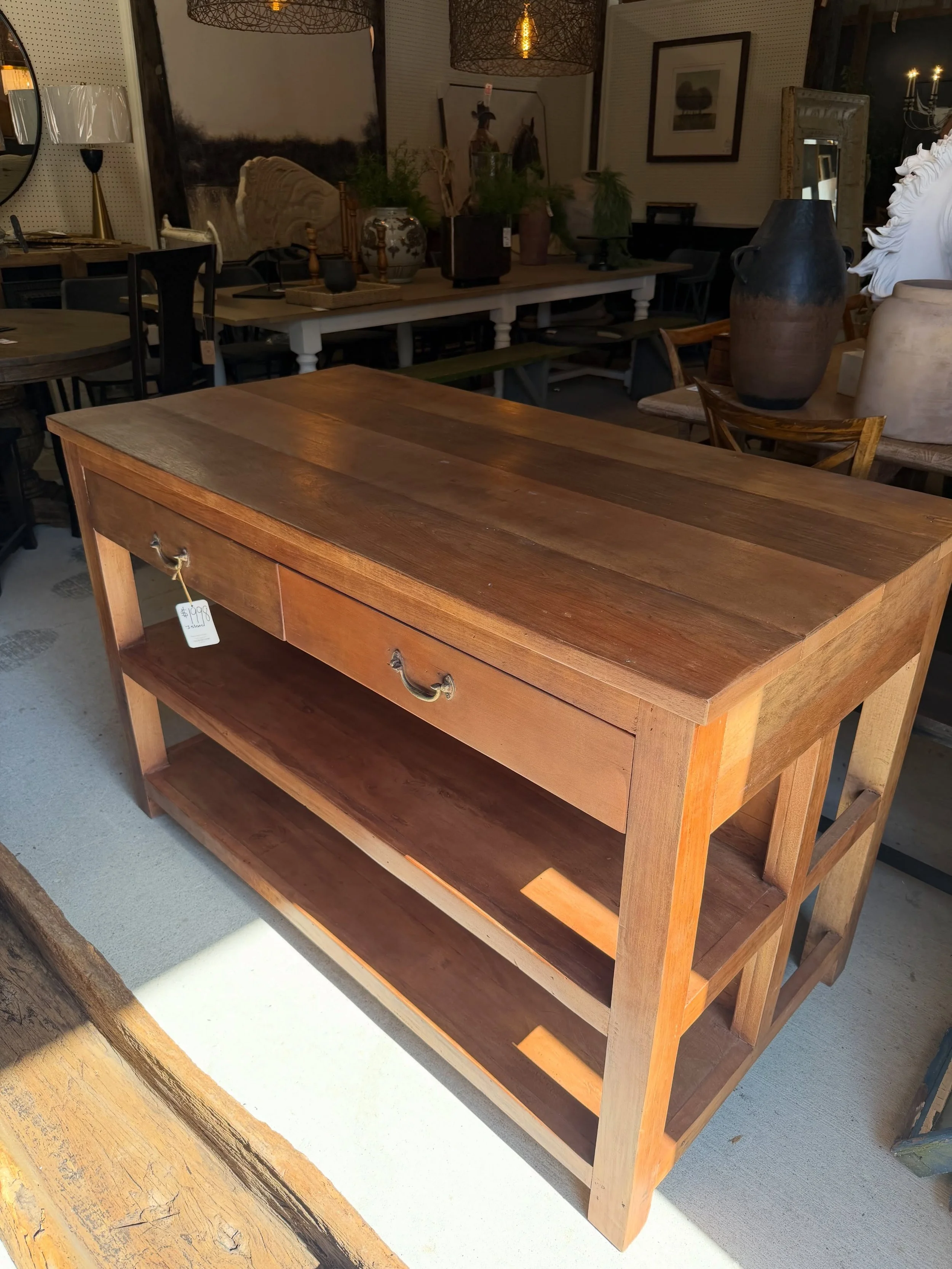 Character, history, and function&mdash;all in one beautiful piece. This island is made from hand-selected reclaimed factory beams and floor planks, giving every mark and variation a story of its own. The opposite side offers extra storage with two dr