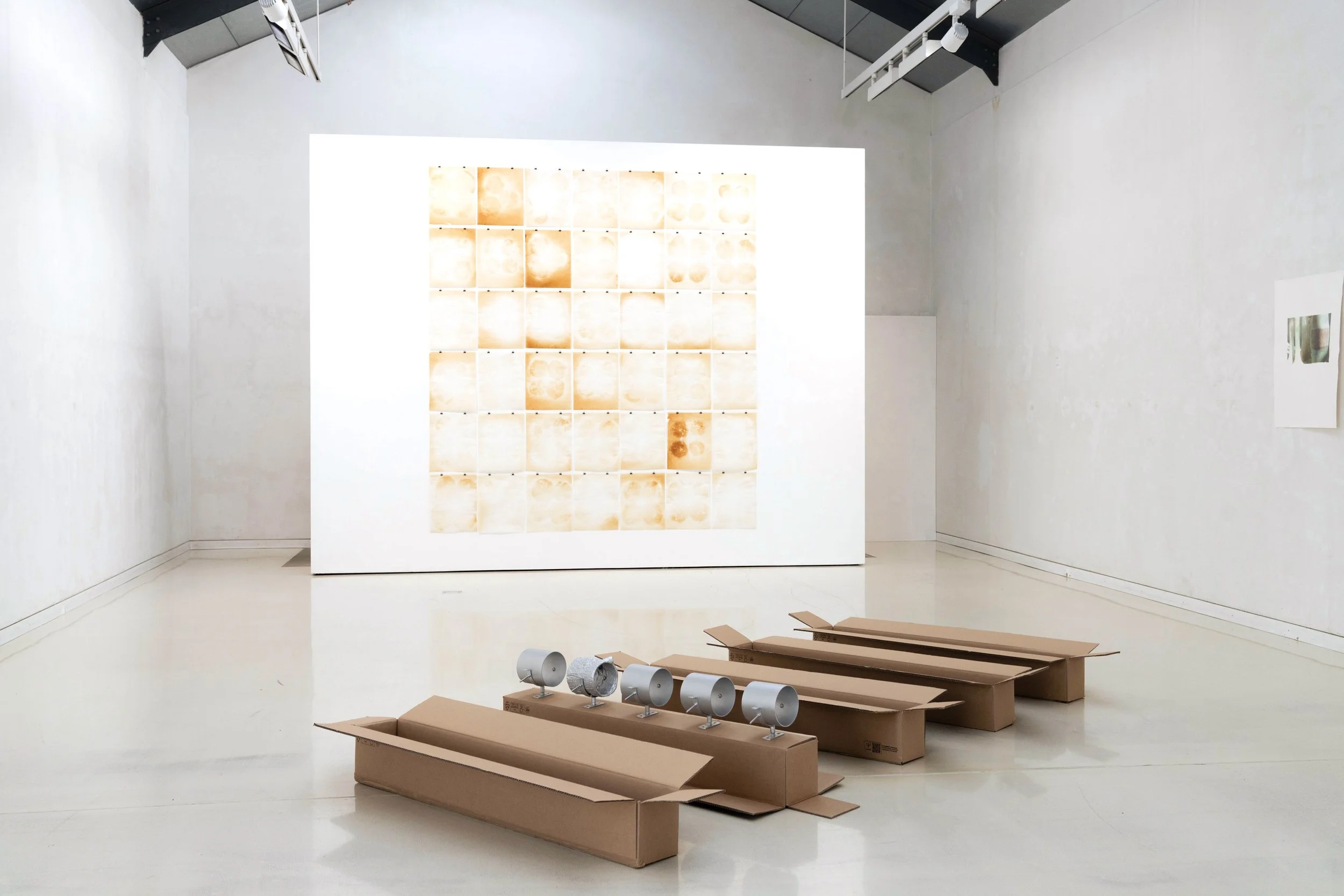 Untitled (Recollecting), 300cm x 130cm x 30cm, steel, cast tin, aluminum paint, cardboard boxes, 2025
