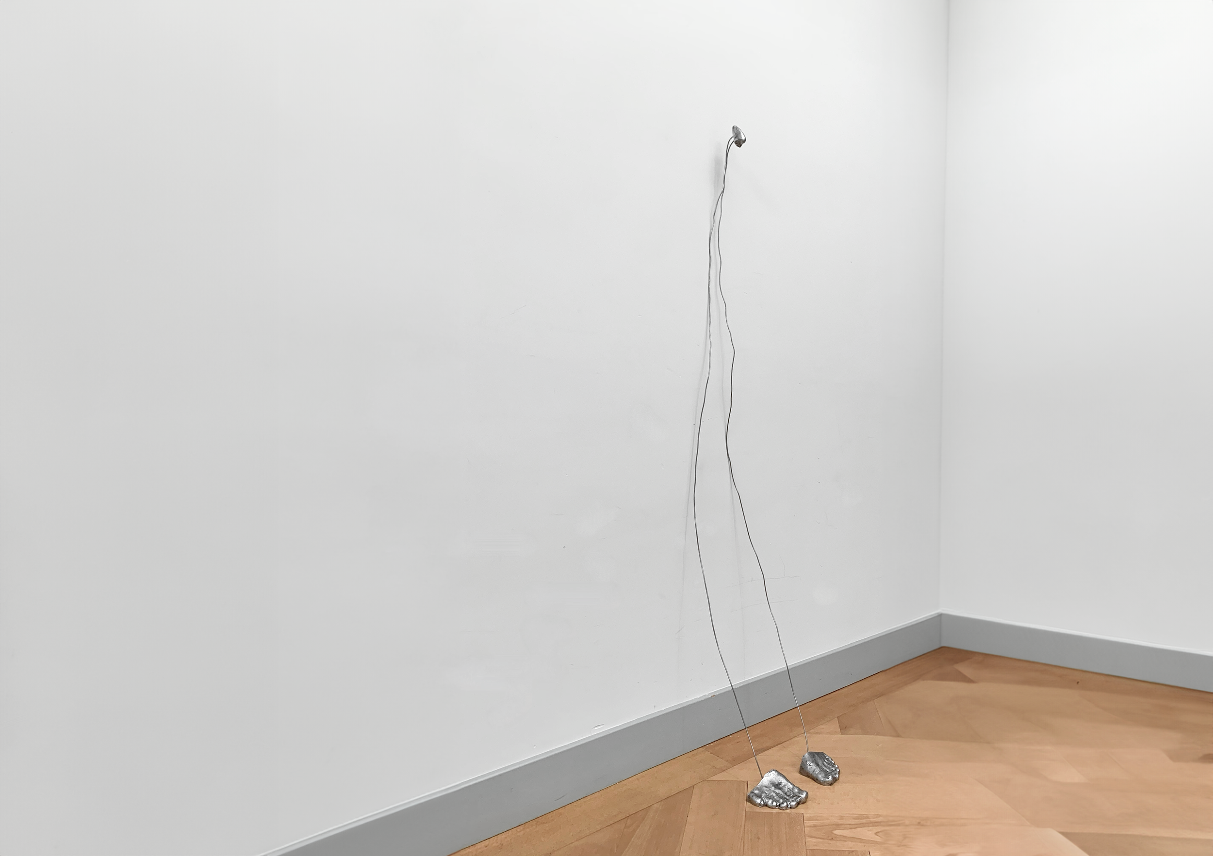 Untitled (Leaning Figure), height: 160cm, cast tin, steel wire, 2024