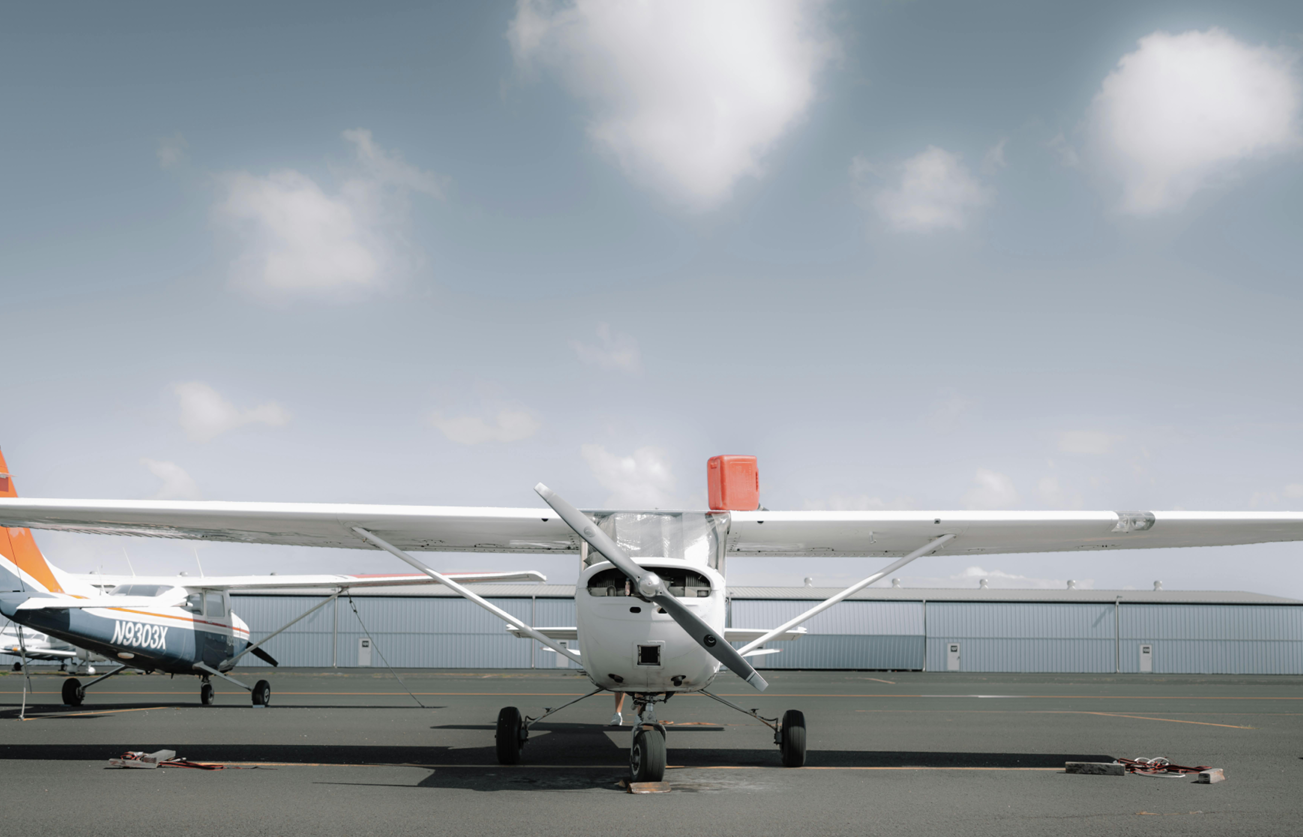 Single-engine general aviation aircraft on runway supported by mobile aircraft maintenance and inspection services in Southern California