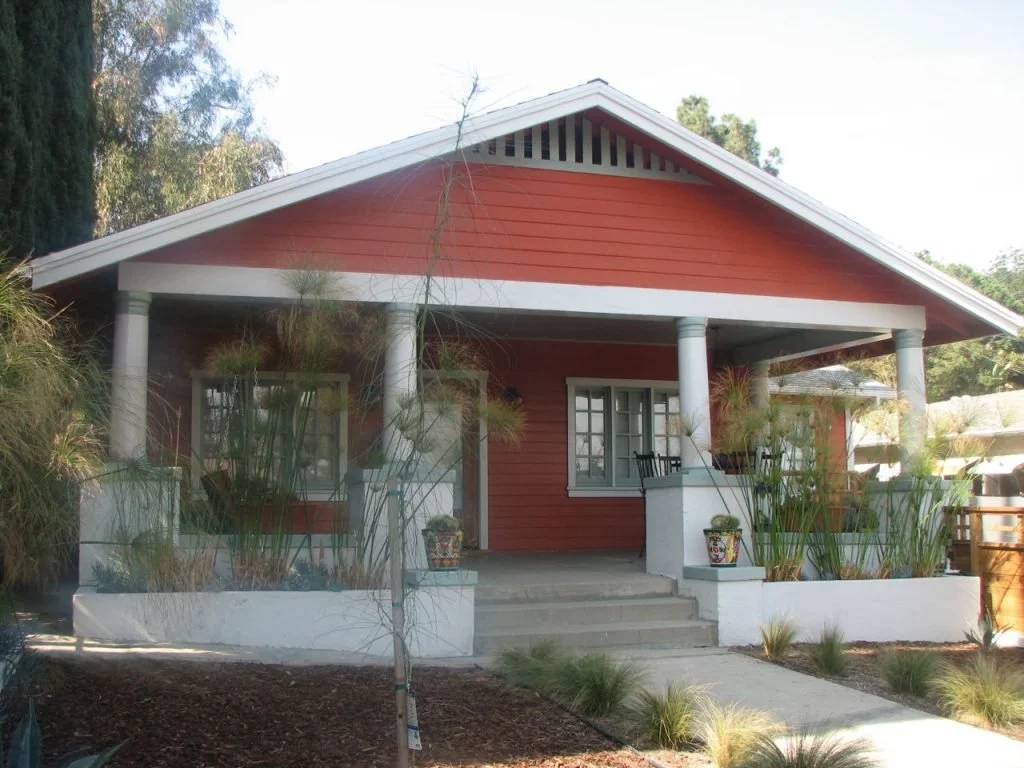 This front gabled Craftsman at 1035 Dexter features a wide front porch with four Tuscan columns that are supported by concrete pillars. The owner did a complete renovation that included de-stuccoing the house and replacing nearly half of the clapboar