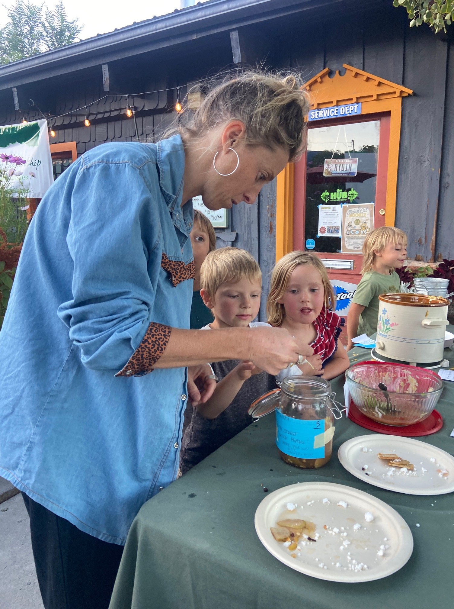 Thank you to everyone who joined us on the Hub patio last night for our 2nd annual Competitive Potluck! The big winners included Jessa's Fulton Street Pickled Pears (especially loved by the kiddos as you can see), Moose's bear pozole, Lizzie's huckle