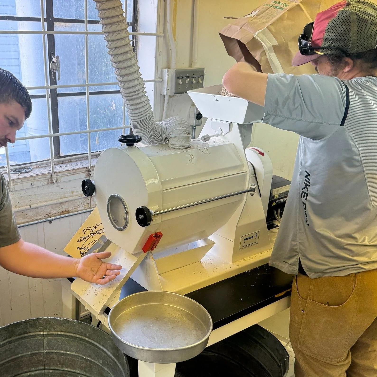The Native Plants Program seed cleaning shop has a sizeable array of equipment specifically designed for cleaning many kinds of seed. From metal drums with spinning chains to dislodge seed from hard pods to sieves and air separators used to separate 