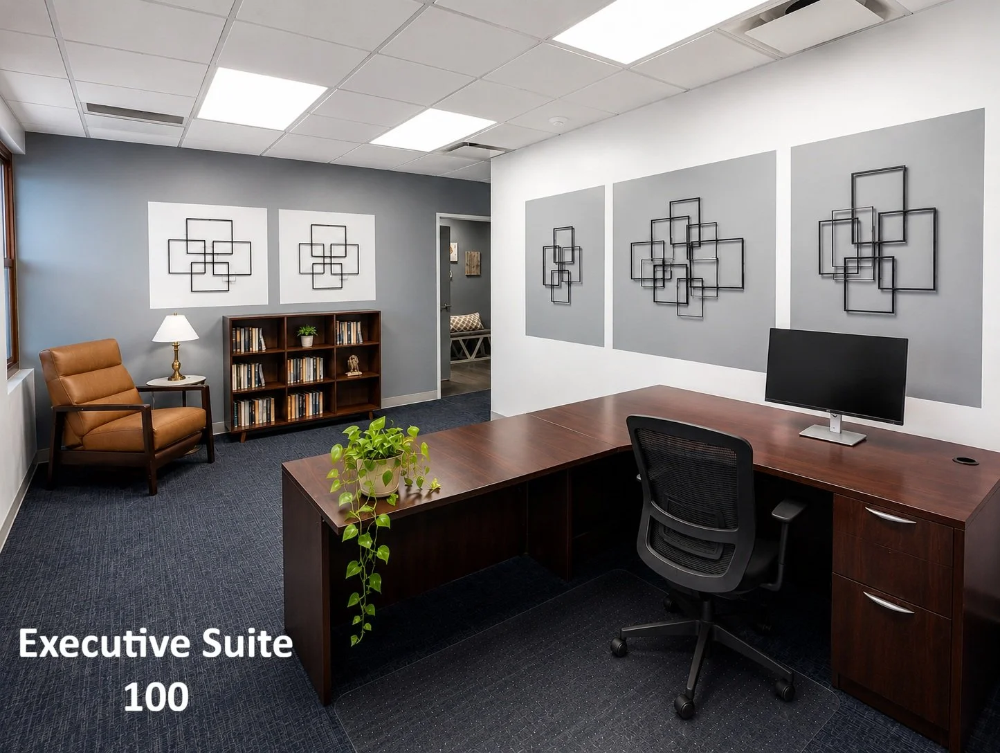 Executive Suite 100 is a fully furnished private office designed for productivity and professionalism, featuring executive-style finishes, natural light from three windows, and a welcoming layout ideal for client meetings and daily operations.