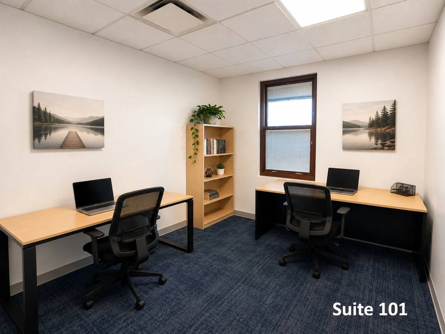 Suite 101 is a bright, efficient workspace tailored for focused professionals, offering a clean modern design, comfortable dual-workstation layout, and a quiet setting ideal for productivity and collaboration.