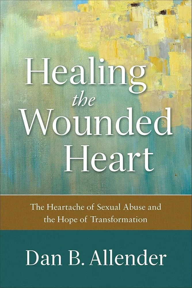 Book cover titled "Healing the Wounded Heart" by Dan B. Allender, with a background of abstract yellow, green, and blue brushstrokes, and a brown band with the subtitle about sexual abuse and hope for transformation.